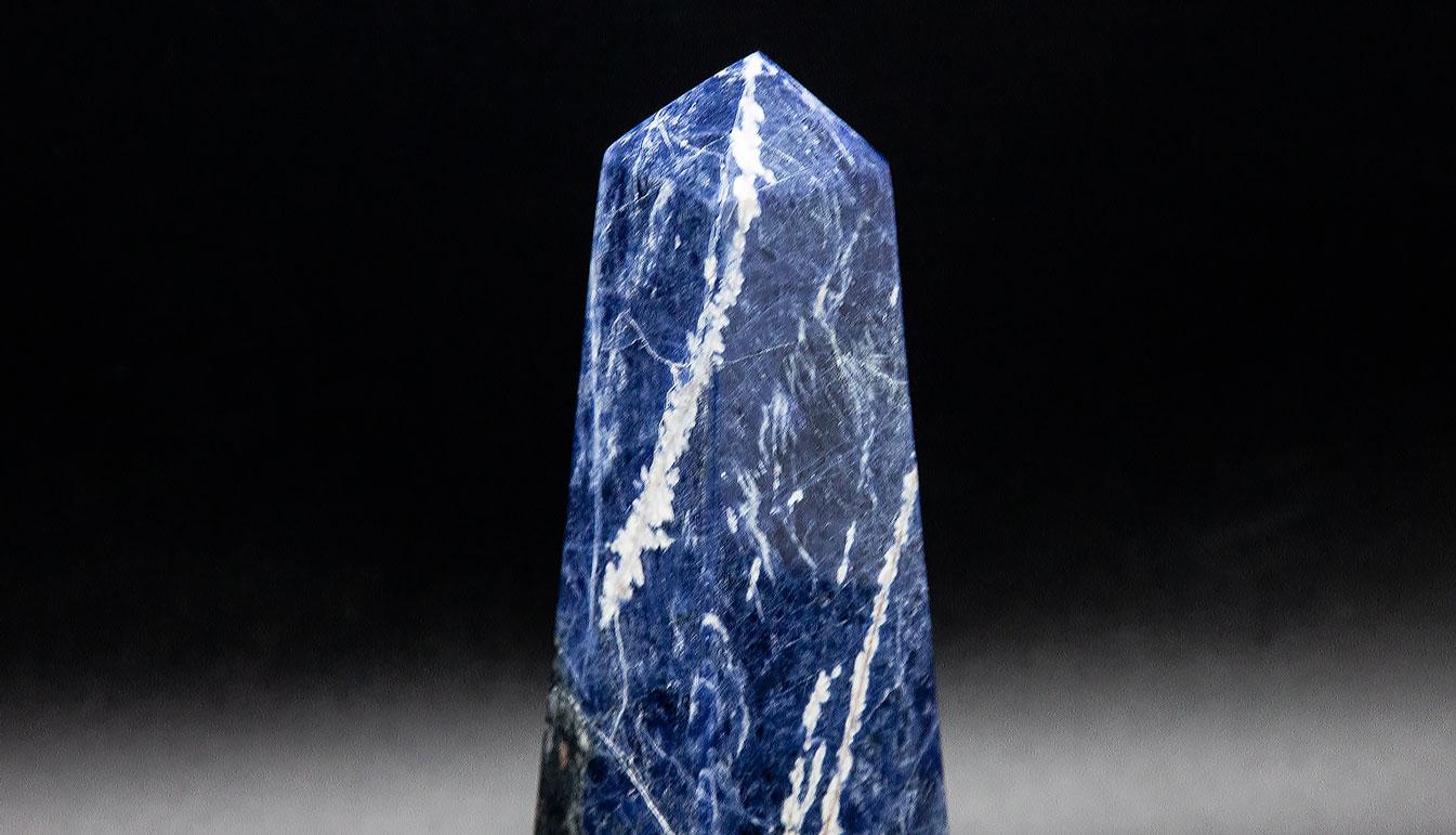 Hand-carved Sodalite Obelisk from North America. Sodalite is a royal blue mineral, discovered in 1811 in Greenland.  In Ancient Greek it is called salt stone, and is said to bring calmness. 2.25