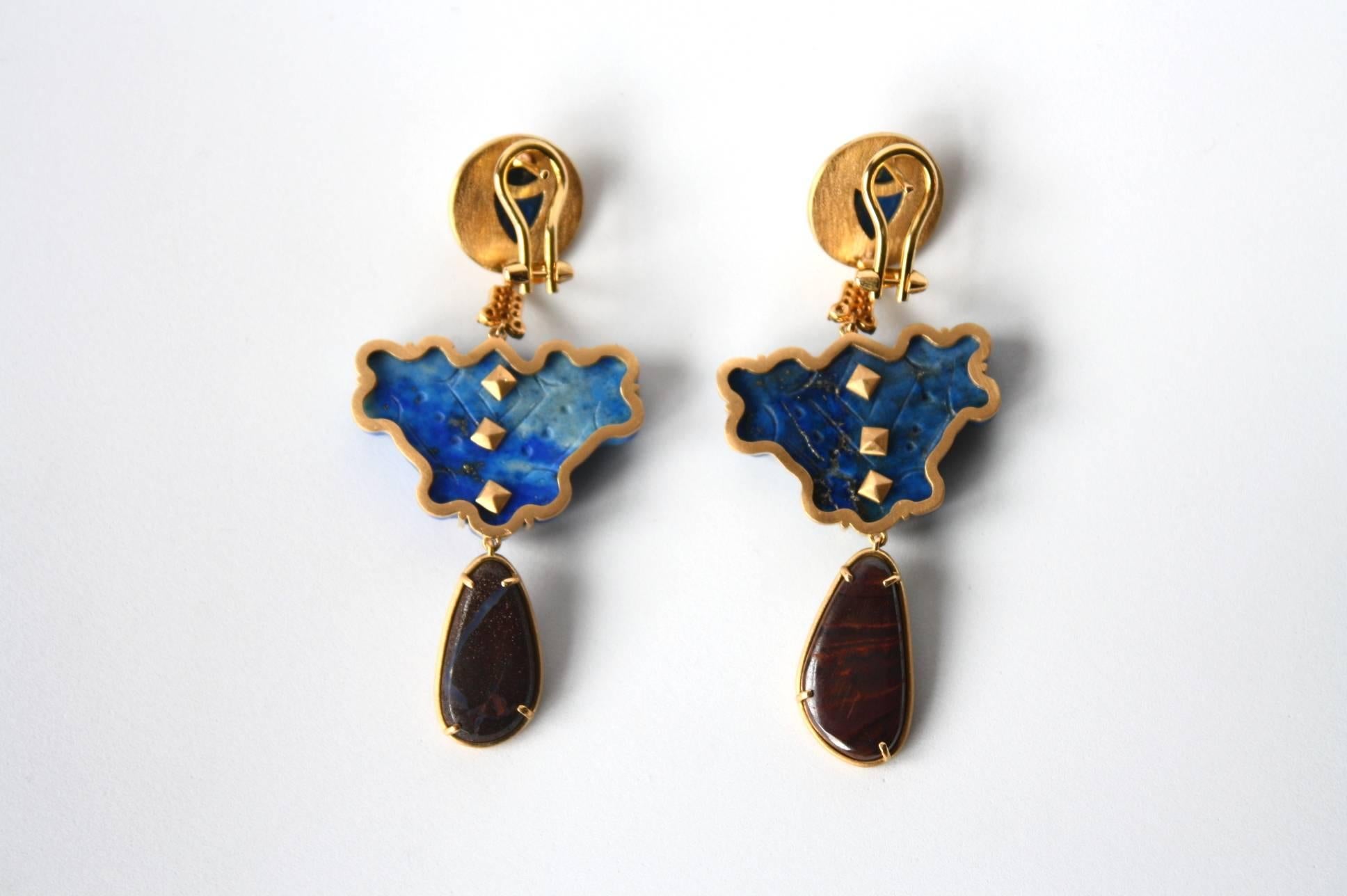 Antiques Chinese lapis lazuli carved stone and drop, brushed yellow gold gr 17,20, diamonds Cts 0,48 Australian opal dublette. total length 6,5 cm, weight 12,7 gr each.
All Giulia Colussi jewelry is new and has never been previously owned or worn.