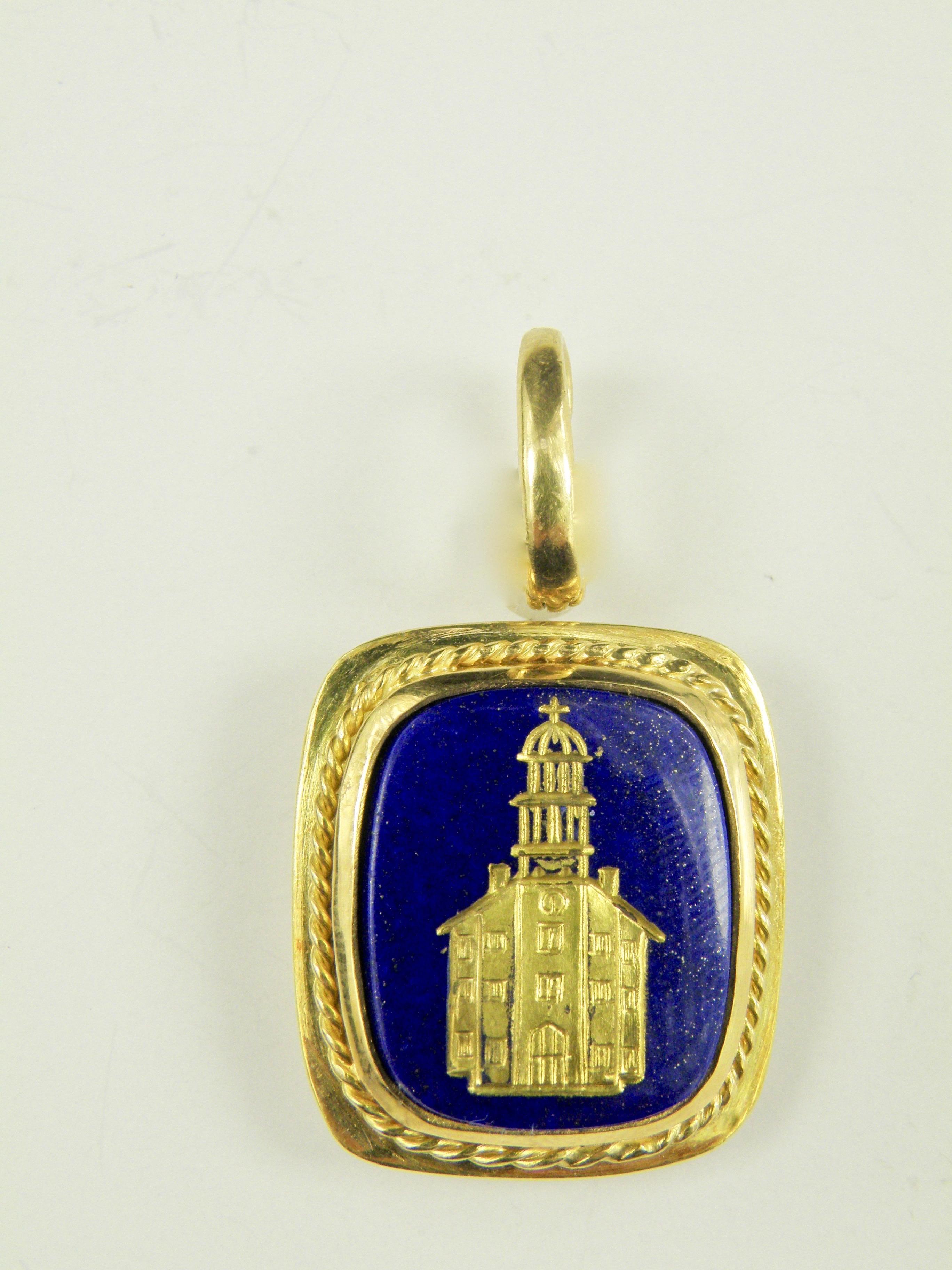 18 mm x 18 mm carved lapis lazuli building with inlaid gold.

