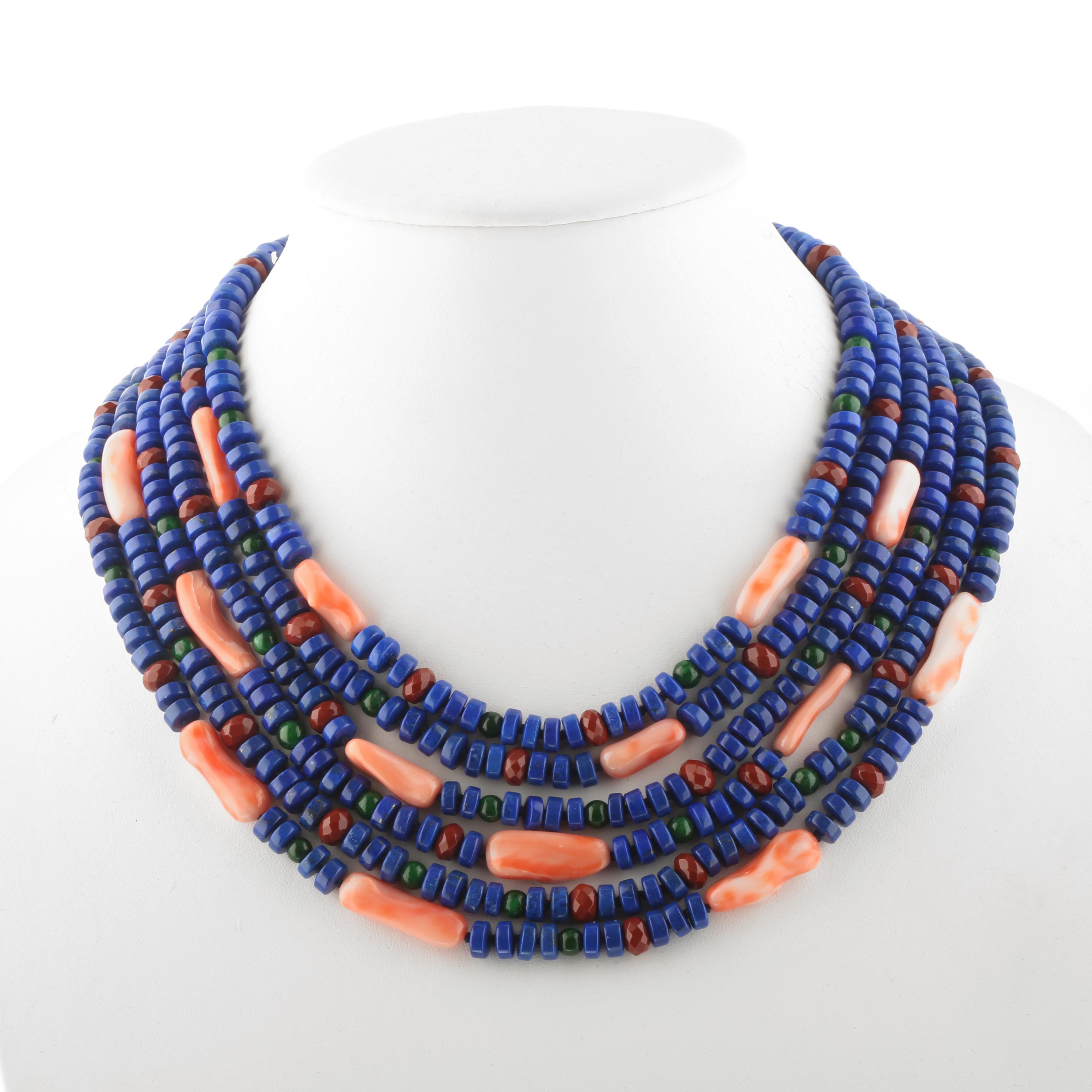 Inspired by the treasures of ancient Europe, this summer vibe necklace is made with natural precious stones.

• Gilded silver closure
• Lapis, Pink Coral, Red Jasper
• Total number of strands 6
• Total length 45 cm
• Total weight 249 g

At Intini