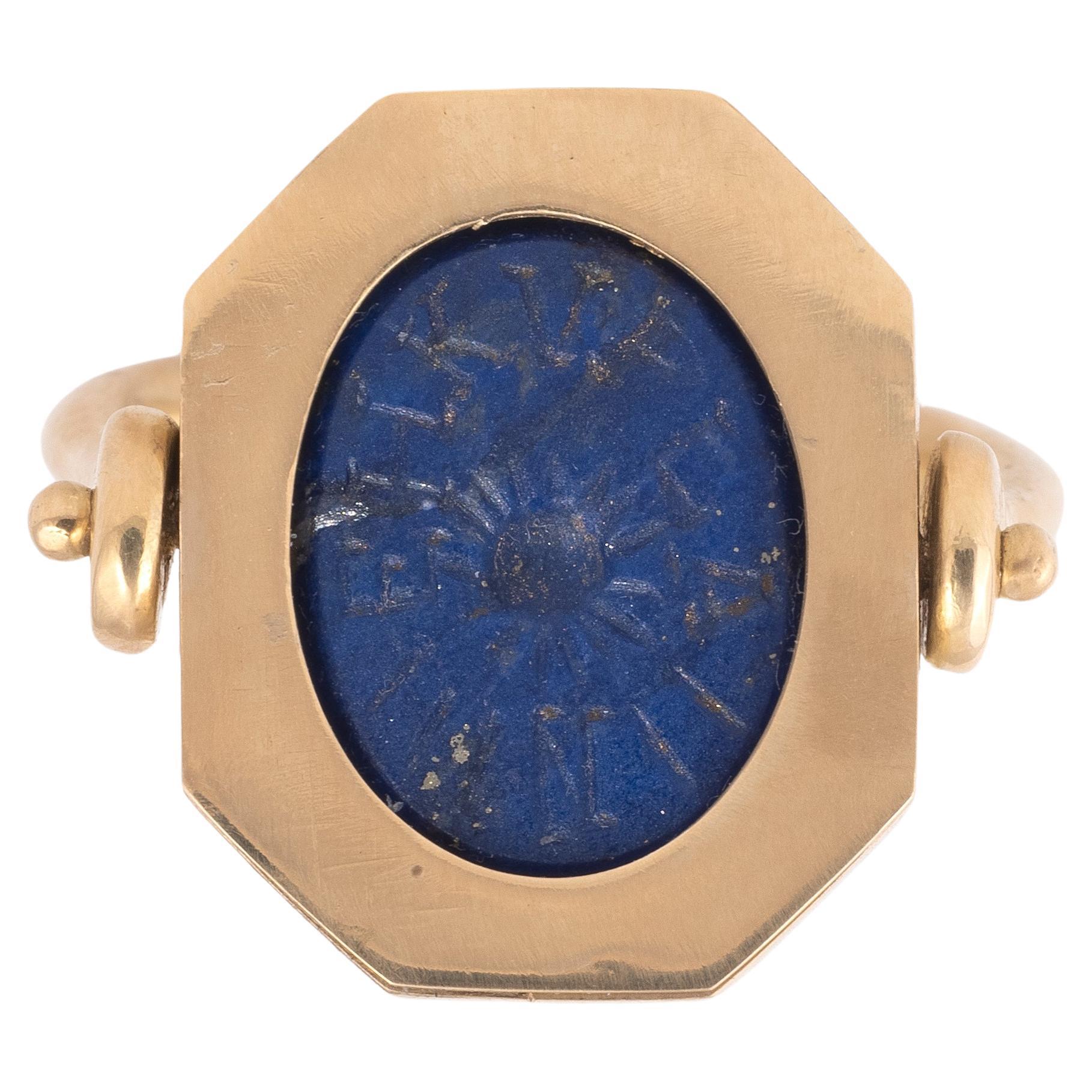 Ring in 18kt yellow gold a lapis lazuli abraxas with double sided magical inscription, III-IV century AD with a pivoting octagonal bezel.
Group of roman magic intaglios. 3nd - 4rd century AD for the intaglio.
Dimensions of the intaglio: 16mm x