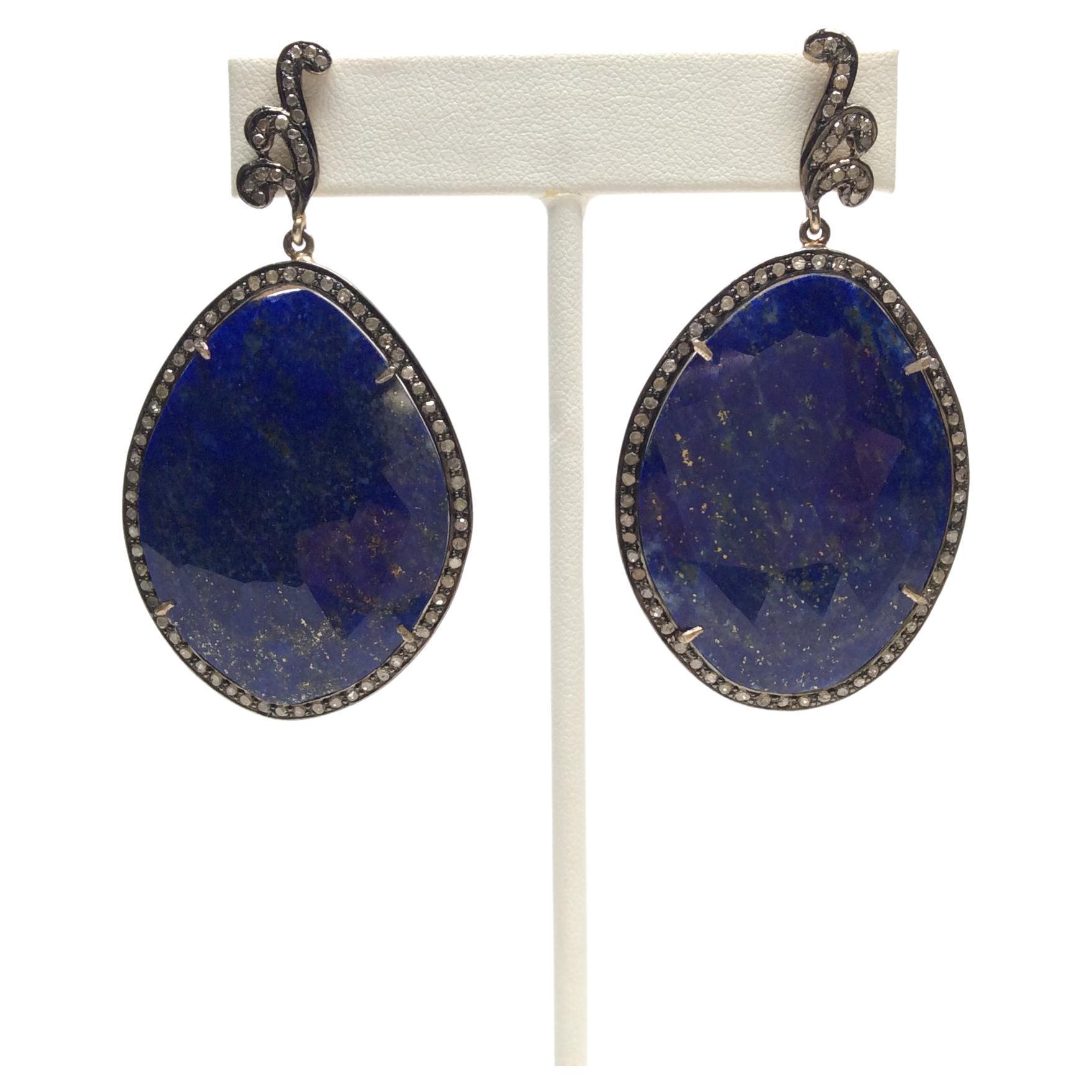 Lapis Lazuli stones

Champagne diamonds

Dimensions: 2 5/8″ L, 1.5″W
