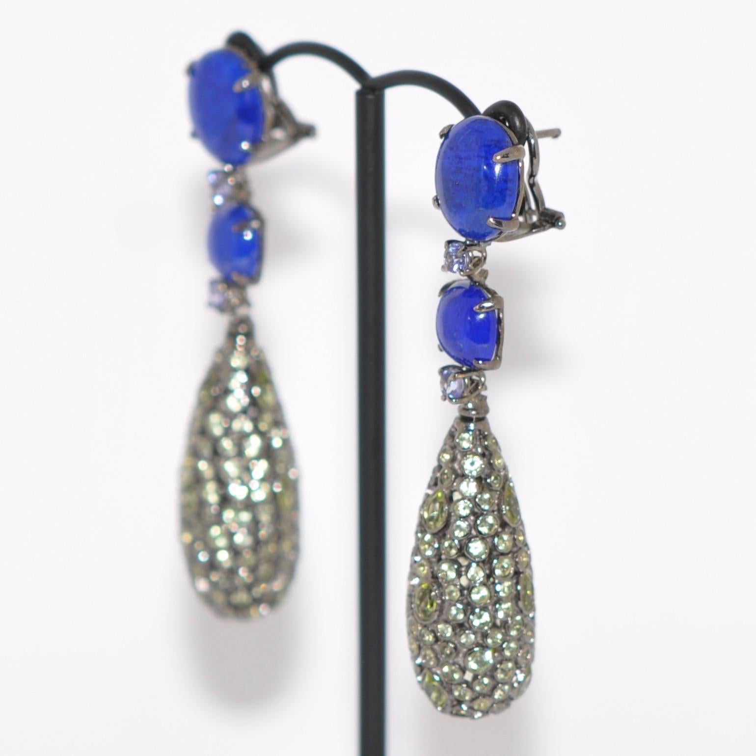 Lapis Lazuli, Tanzanite and Peridot on Black Gold 18 Karat Chandelier Earrings.
Lapis Lazuli
Tanzanite
Peridot
Black Gold 18K