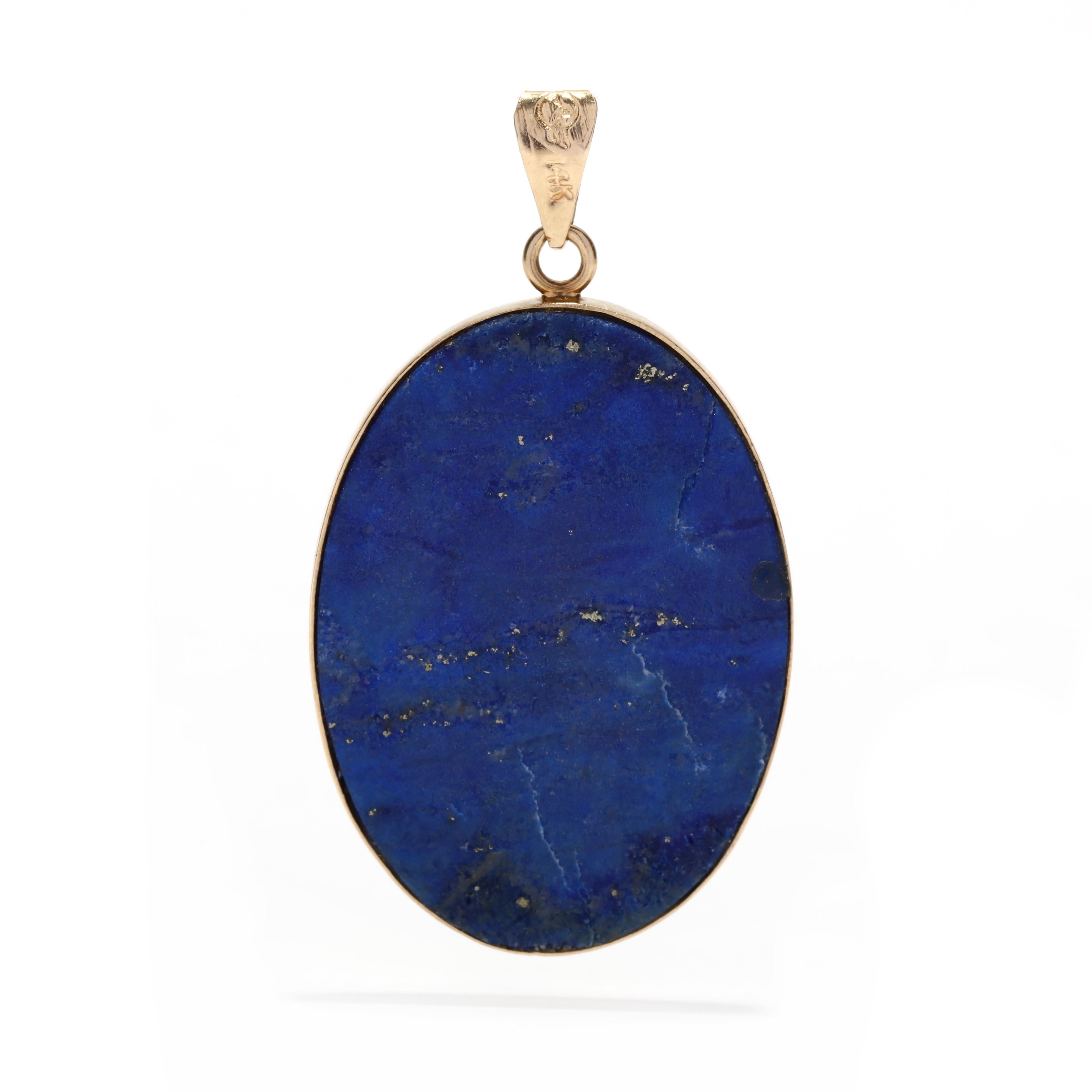 A vintage 14 karat yellow gold lapis panda pendant. This pendant features an oval tablet blue lapis lazuli stone with a gold over lay depicting a scenic portrait of a panda, and all bezel set with a tapered bail.

Length: 1 3/8 in.

Width: 3/4