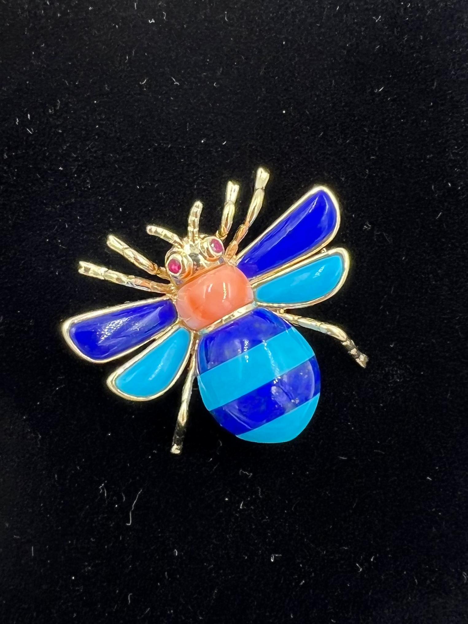 Lapis turquoise Coral Ruby Yellow Gold Bee Brooch.

ABOUT THIS ITEM: P-DJ412D  A colorful bee with lapis, turquoise, coral and ruby eyes.  It a sheer delight, Sure to light up any outfit!

SPECIFICATIONS;

 METAL: 14k yellow gold.

WEIGHT: 4.5