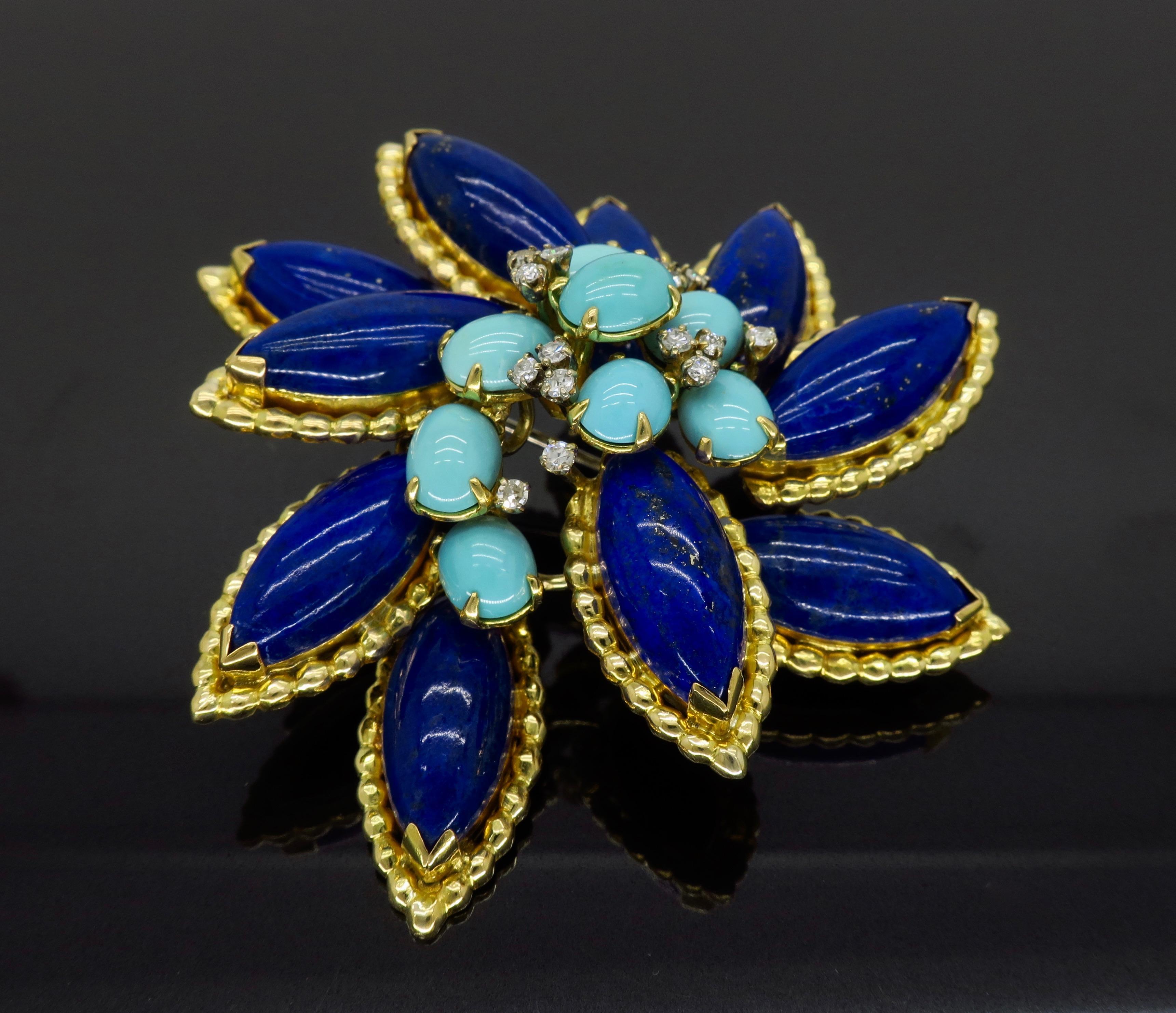 Vintage Lapis Lazuli, Turquoise and Diamond brooch that can be worn as a pendant crafted in 18k yellow gold.

Gemstone: Lapis Lazuli, Turquoise and Diamond
Gemstone Carat Weight: 10 marquise shaped Lapis Lazuli measuring approximately 18x8mm, 8 oval