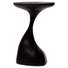 Lapiuta wood gueridon by Antoine Maurice