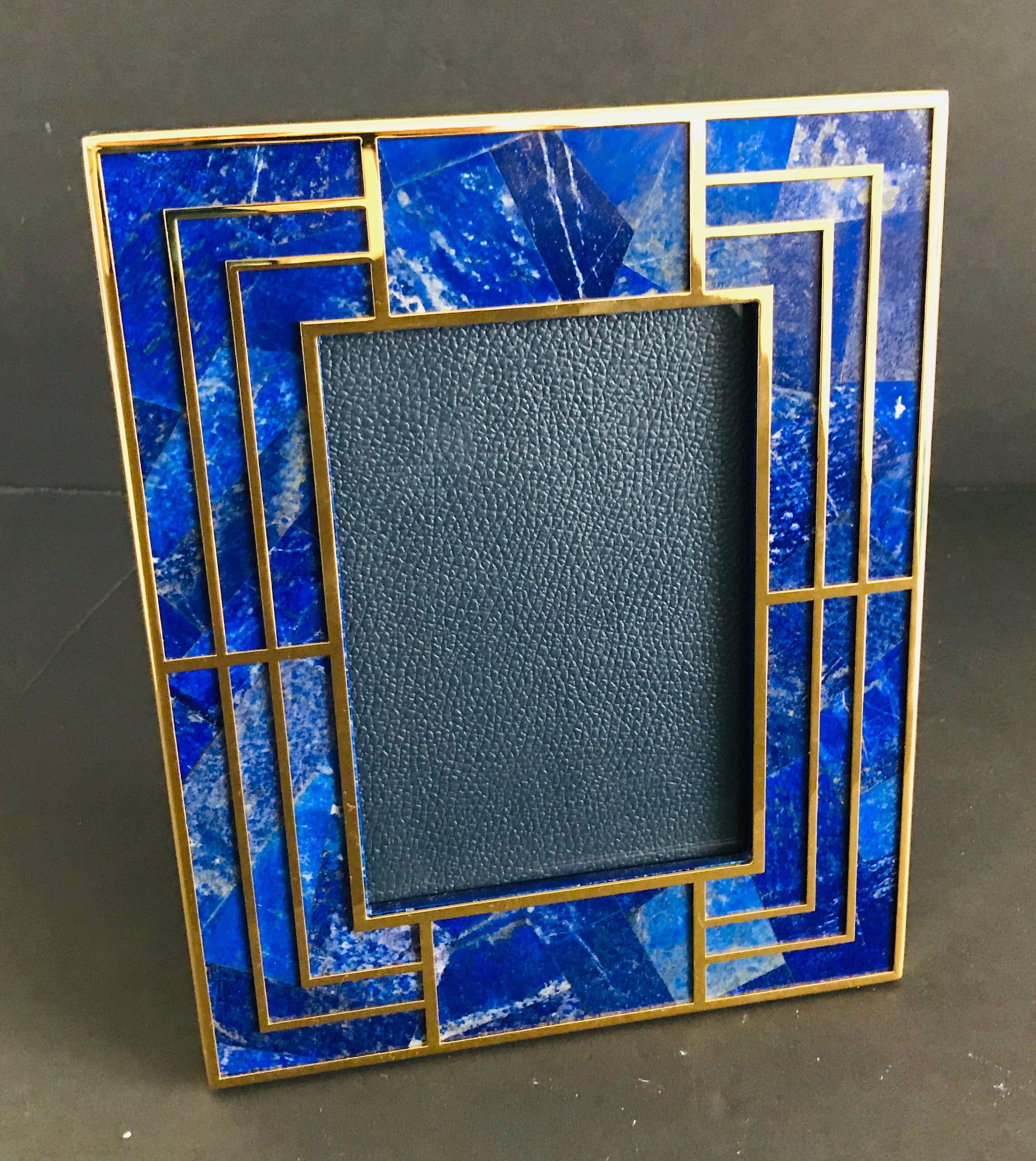 Lapis Lazuli and gold-plated picture frame by Fabio Ltd
Height: 10.5 inches / Width: 8.5 inches / Depth: 1 inch
Photo size: 5 inches by 7 inches
1 in stock in Palm Springs currently ON 20% OFF SALE for $1,999 !!! 
Order Reference #: FABIOLTD PF39