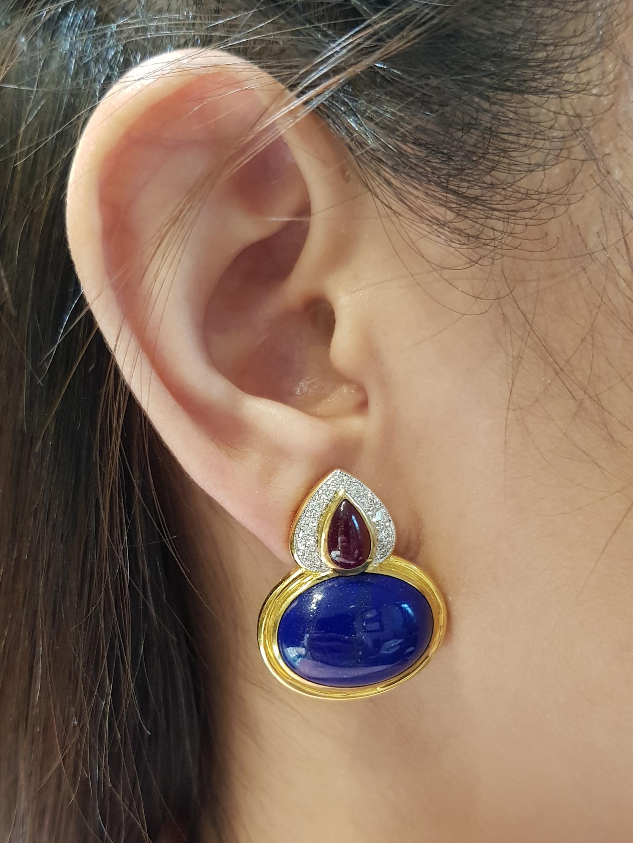 Lapiz Lazuli 35.40 carats with Cabochon Ruby 2.98 carats and Diamond 0.51 carat Earrings set in 18 Karat Gold Settings

Width:  2.5 cm 
Length:  3.0 cm
Total Weight: 21.43 grams

