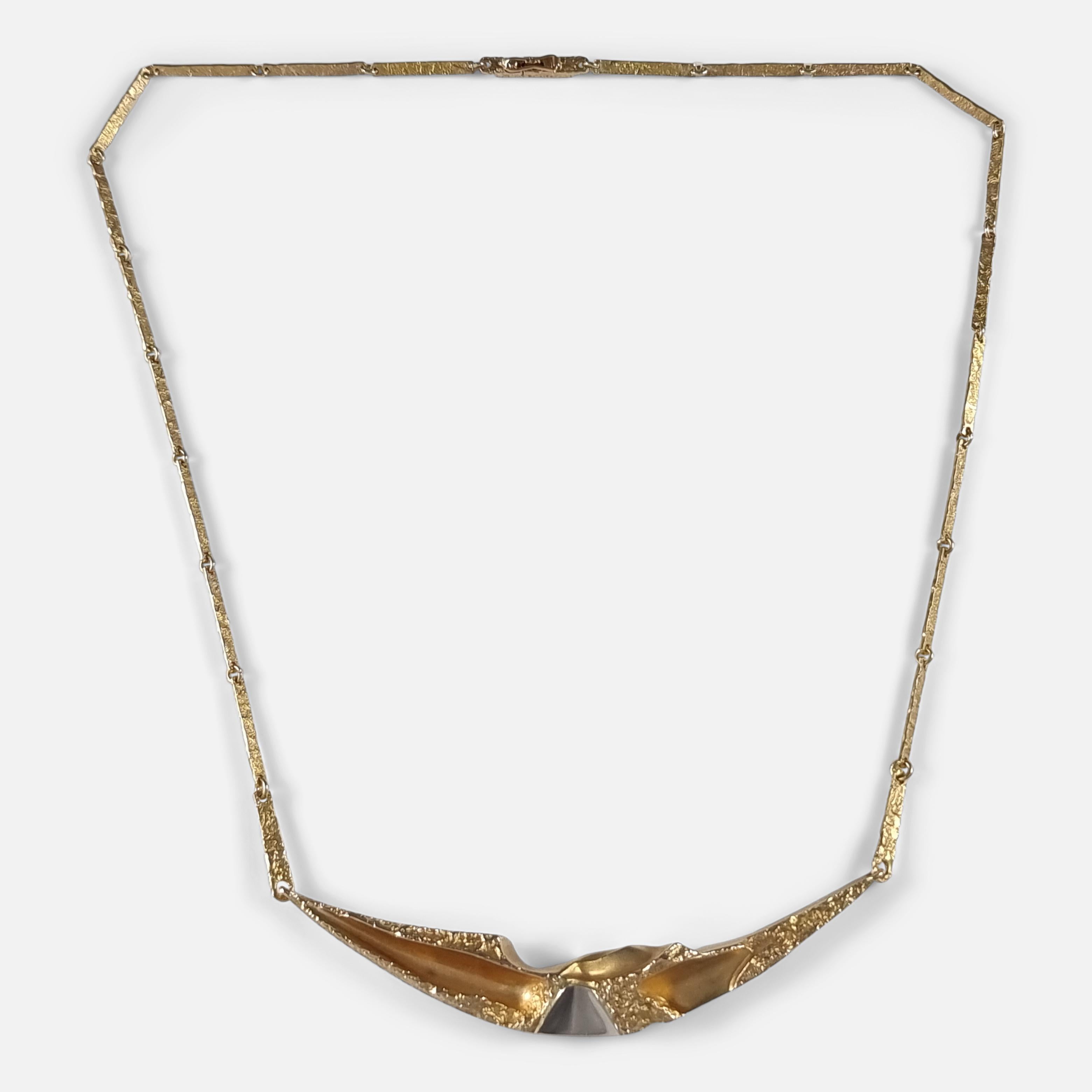 A Finnish 14ct yellow and white gold necklace designed by Björn Weckström for Lapponia. 

Hallmarked with the common control mark '585' indicating 14 carat gold, the makers icon mark of Lapponia, and Finnish date mark 'L8' for 1988.

Period: - Late