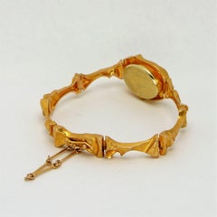 Lapponia, reloj de señora de oro amarillo de 14 quilates.