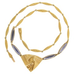 Lapponia Collar largo de oro amarillo de 14k con tanzanita / iolita de 18" con detalles