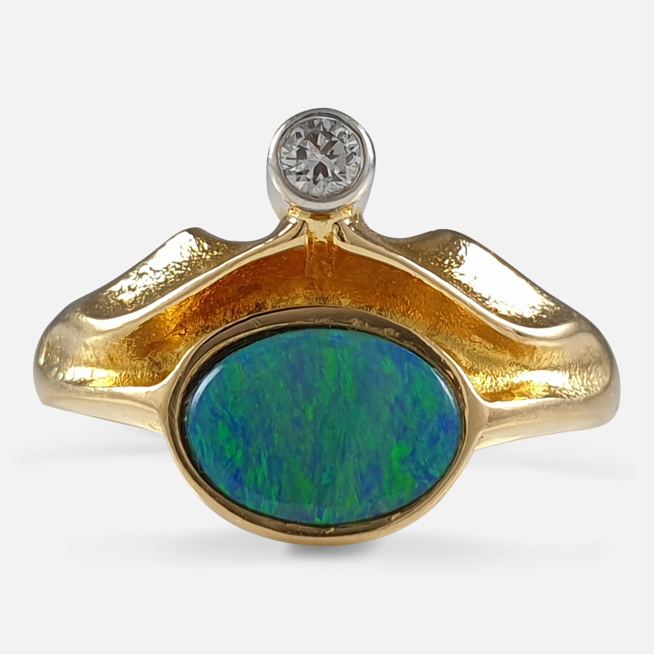 A Finnish 18ct yellow gold 0.04ct diamond and opal doublet ring designed by Zoltan Popovits for Lapponia.

The ring is hallmarked with the Lapponia makers mark, common control mark '750' to denote 18 carat gold, Finnish nation mark, and date code