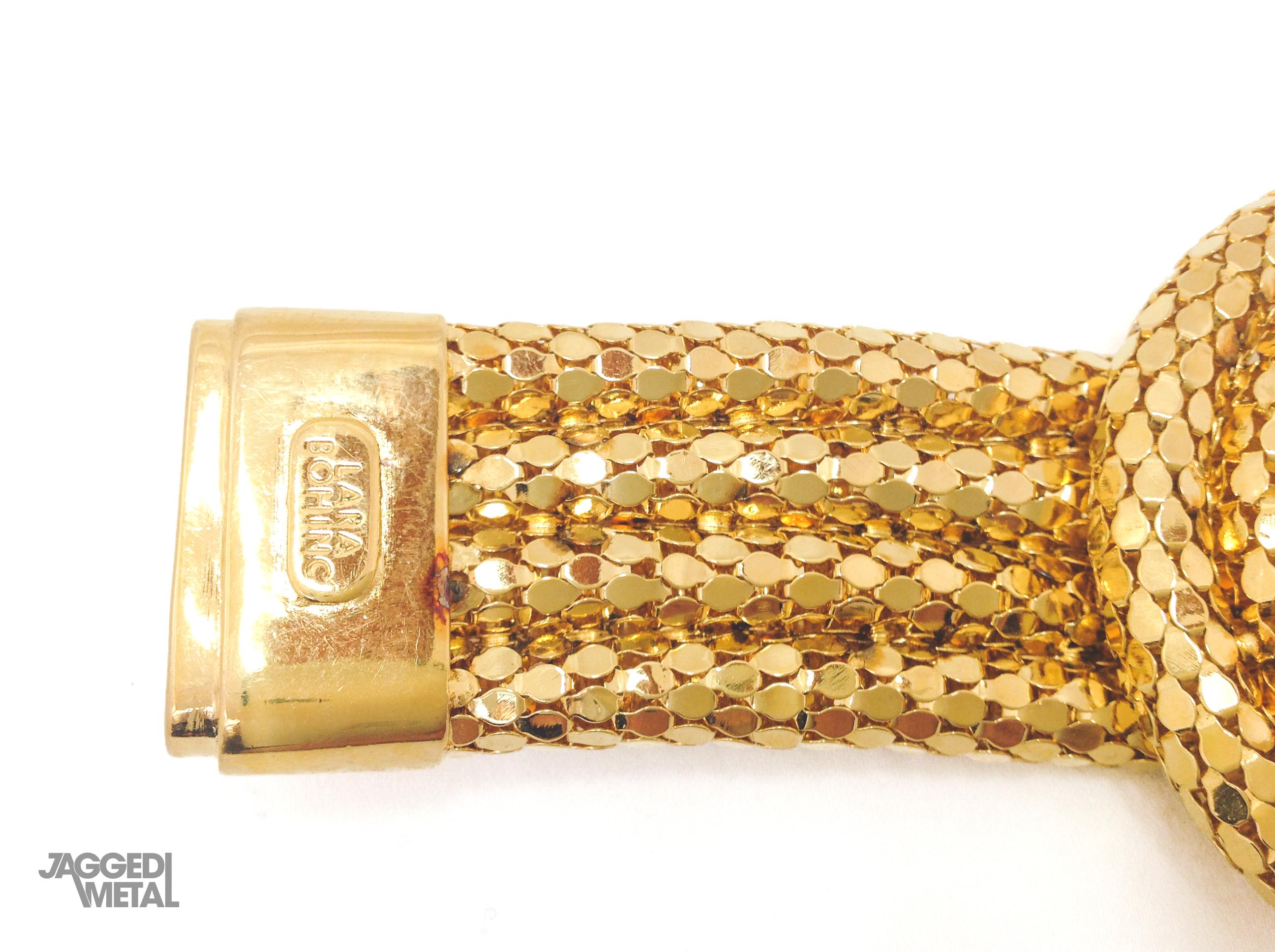 Lara Bohinc Laratella Bracelet Cuff

Fantastic statement gold plated cuff from the iconic jewellery designer Lara Bohinc.

Detail
-Designed in London for the 2009 Spring Collection
-Crafted from gold plated metal

Size & Fit
-Length - approx
