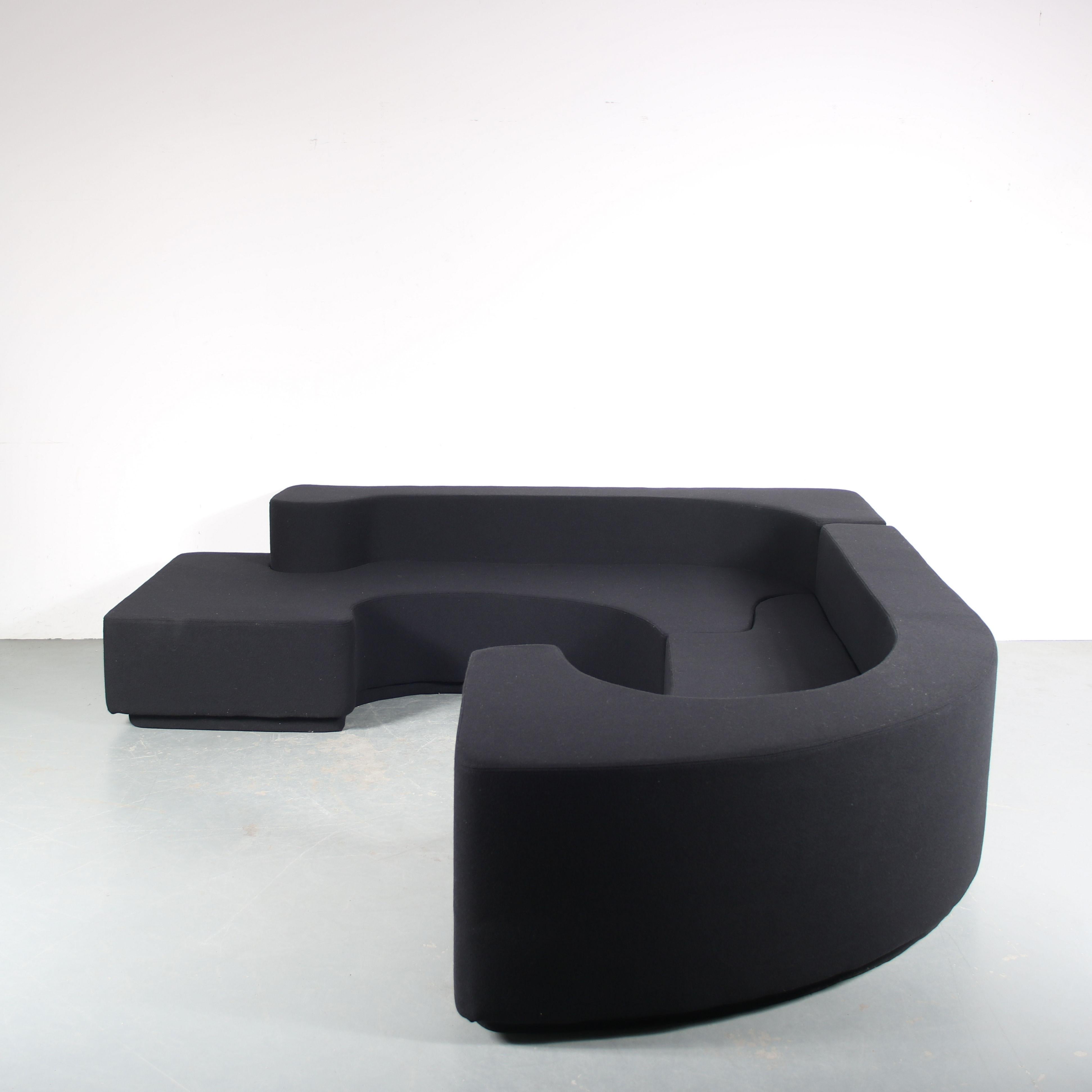 A beautiful “Lara” sofa, designed by Roberto Pamio & Renato Toso and manufactured by Stilwood in Italy around 1970.

This iconic piece has an interlocking design, both elements made of foam completely upholstered in high quality black fabric. The