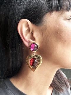 Larg gilt colored clip-on earring, red and pink, Yves St. Laurent, Paris 1980's