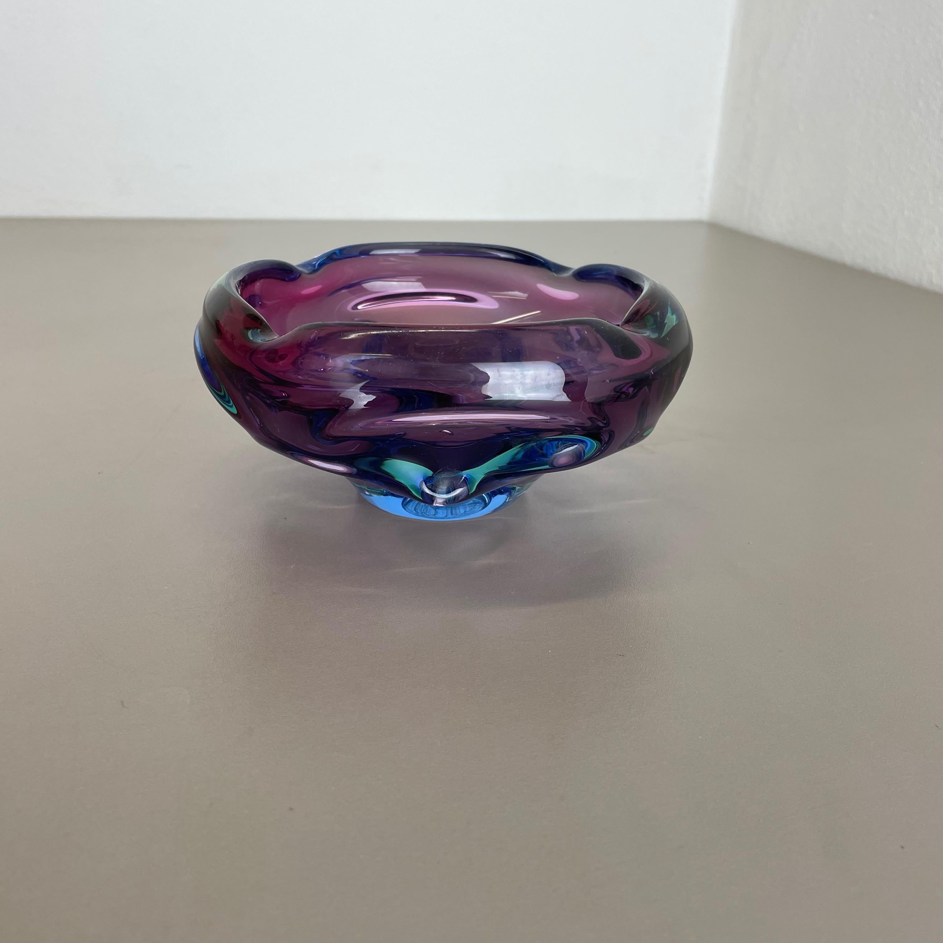 Article:

Murano glass bowl, ashtray element


Origin:

Murano, Italy


Decade:

1970s



This original vintage glass bowl element, ash tray was produced in the 1970s in Murano, Italy. It is made in spceial technique and has a