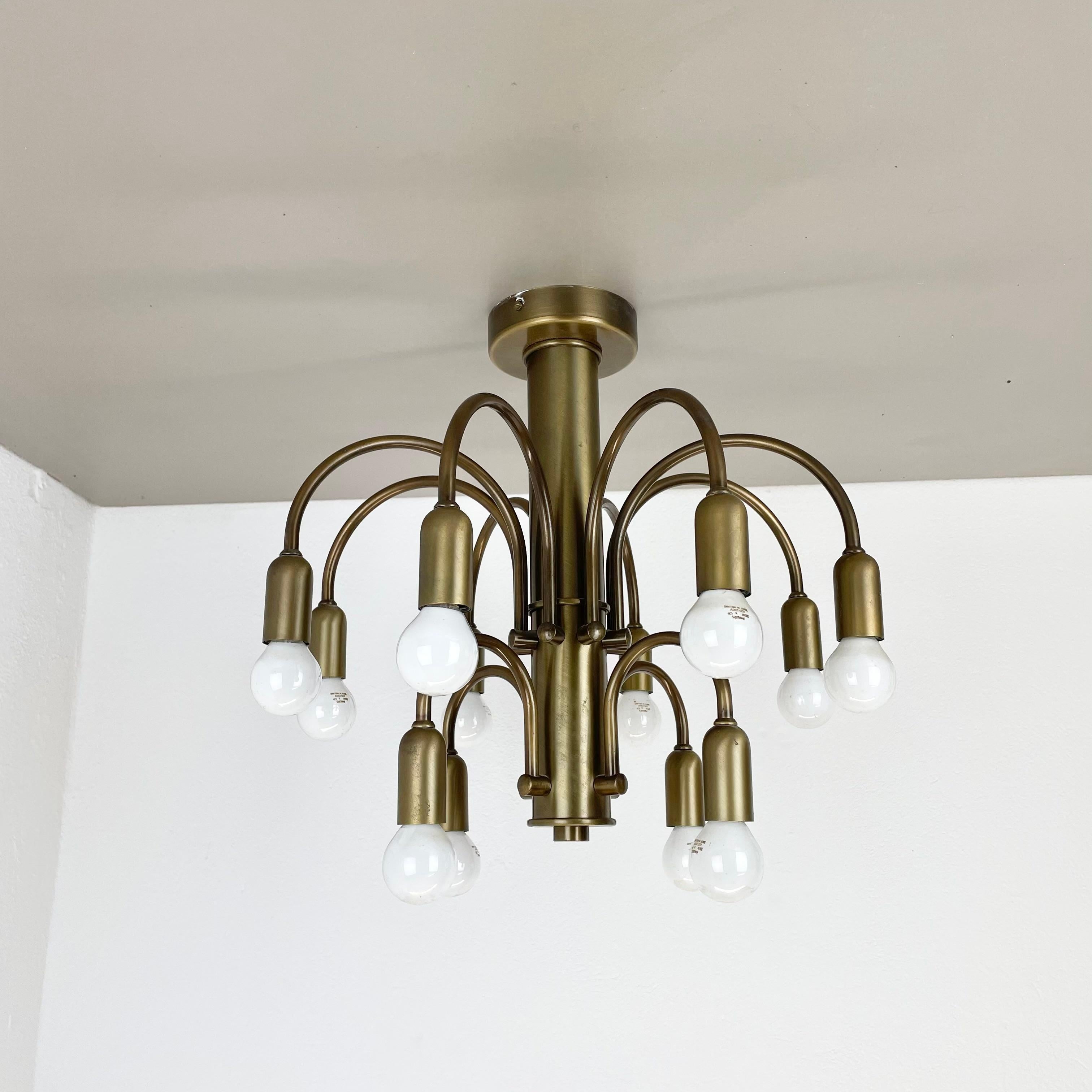large 12-armed solid Brass ceiling light Chandelier by WKR Lights, Germany 1970s For Sale 6