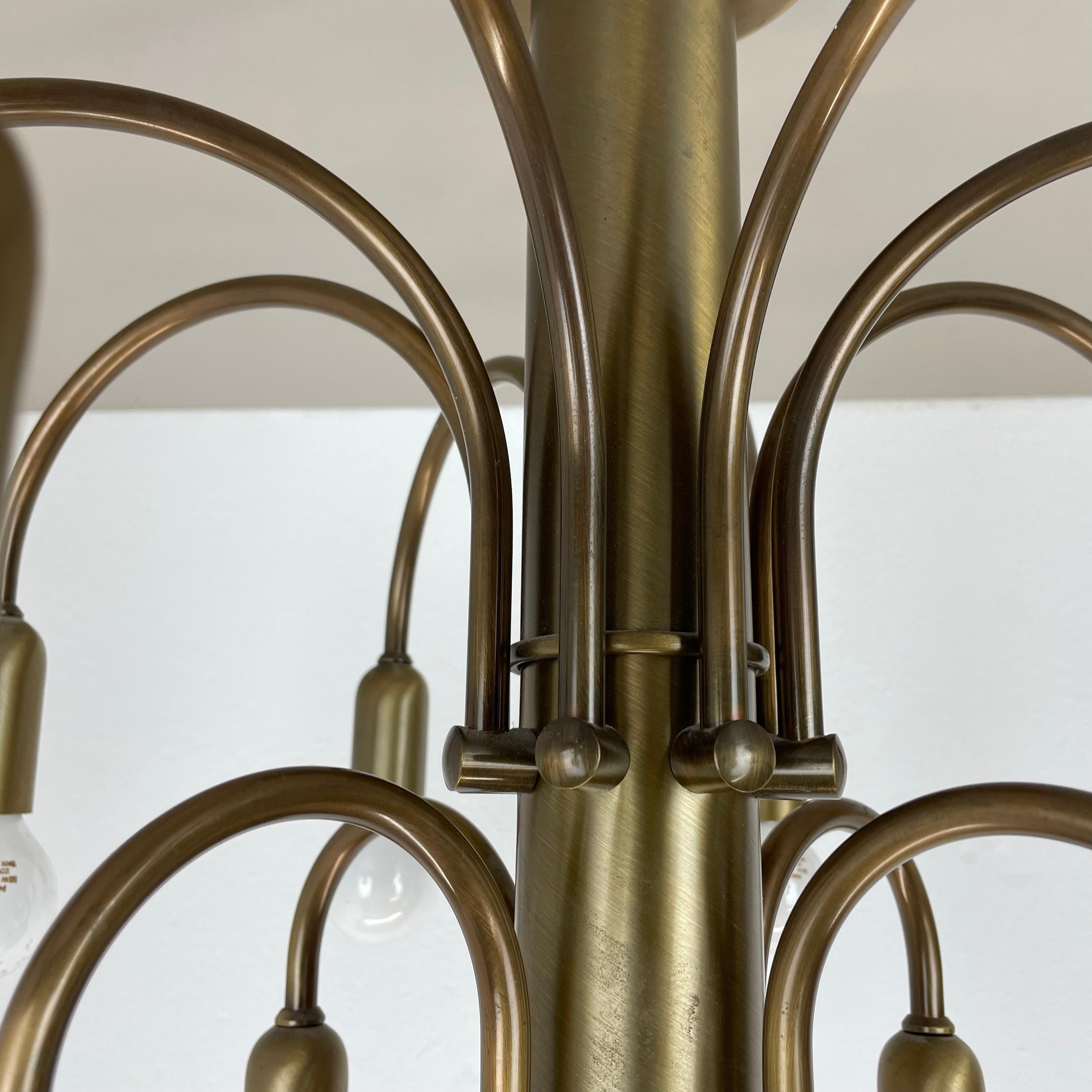 large 12-armed solid Brass ceiling light Chandelier by WKR Lights, Germany 1970s For Sale 8