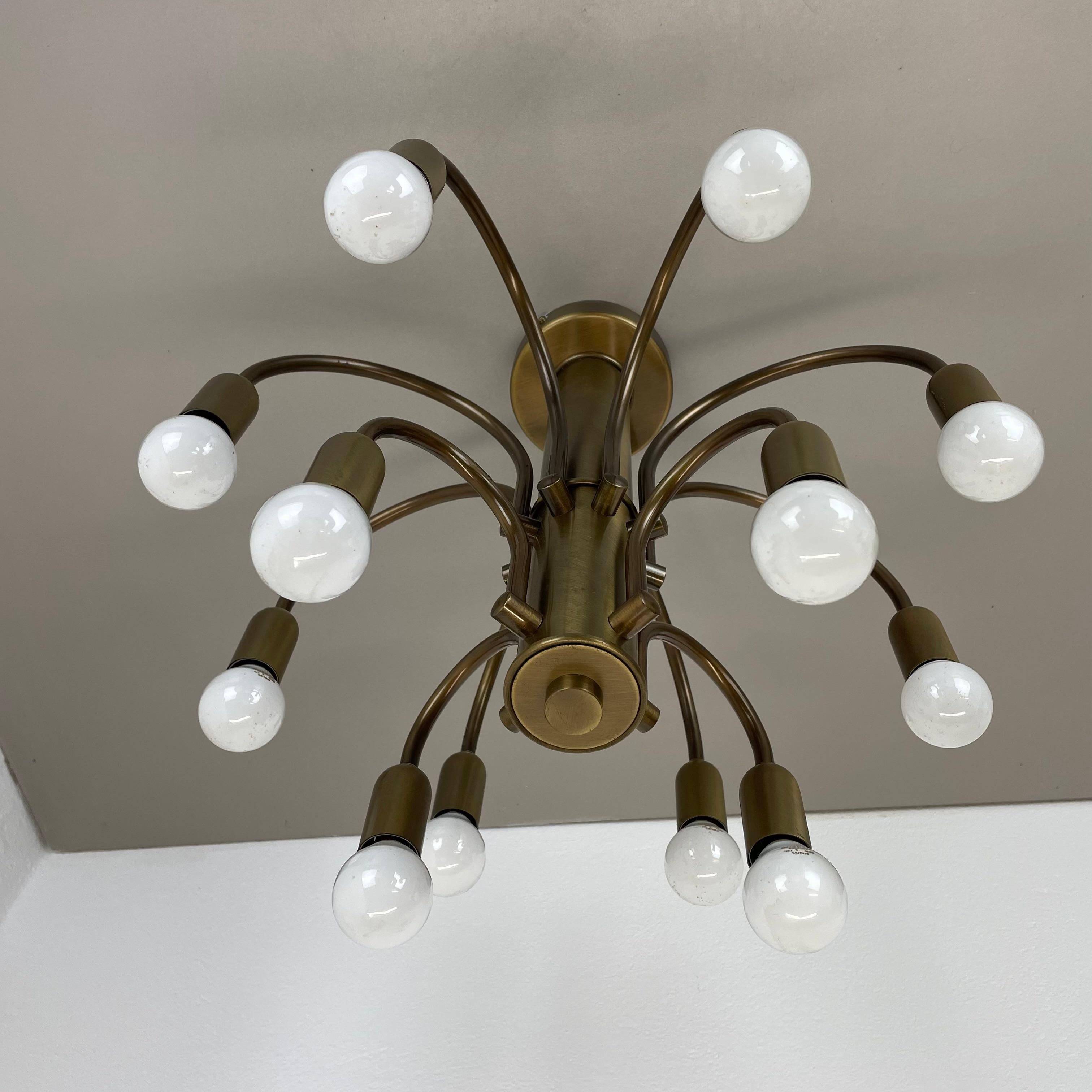 large 12-armed solid Brass ceiling light Chandelier by WKR Lights, Germany 1970s For Sale 10