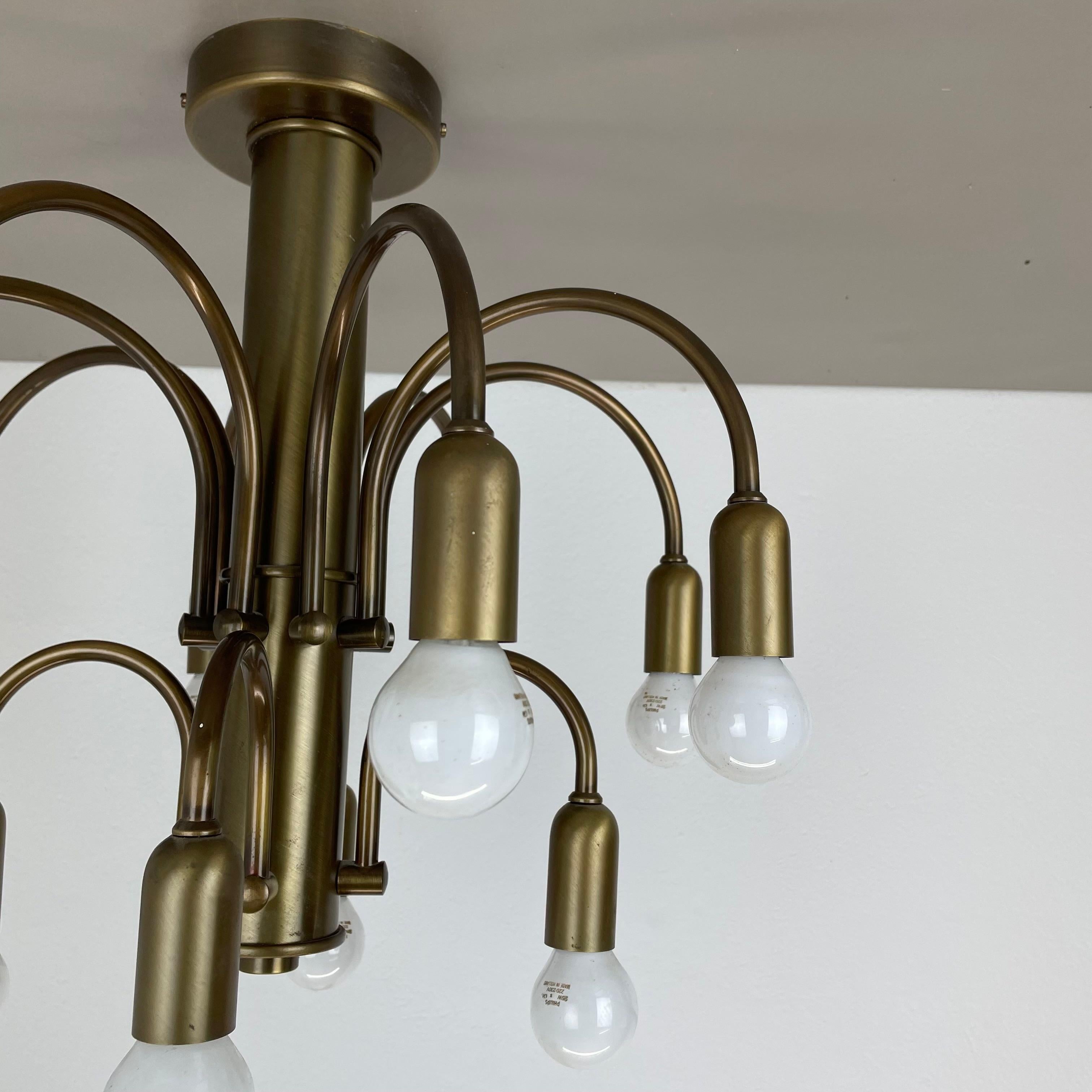 20th Century large 12-armed solid Brass ceiling light Chandelier by WKR Lights, Germany 1970s For Sale