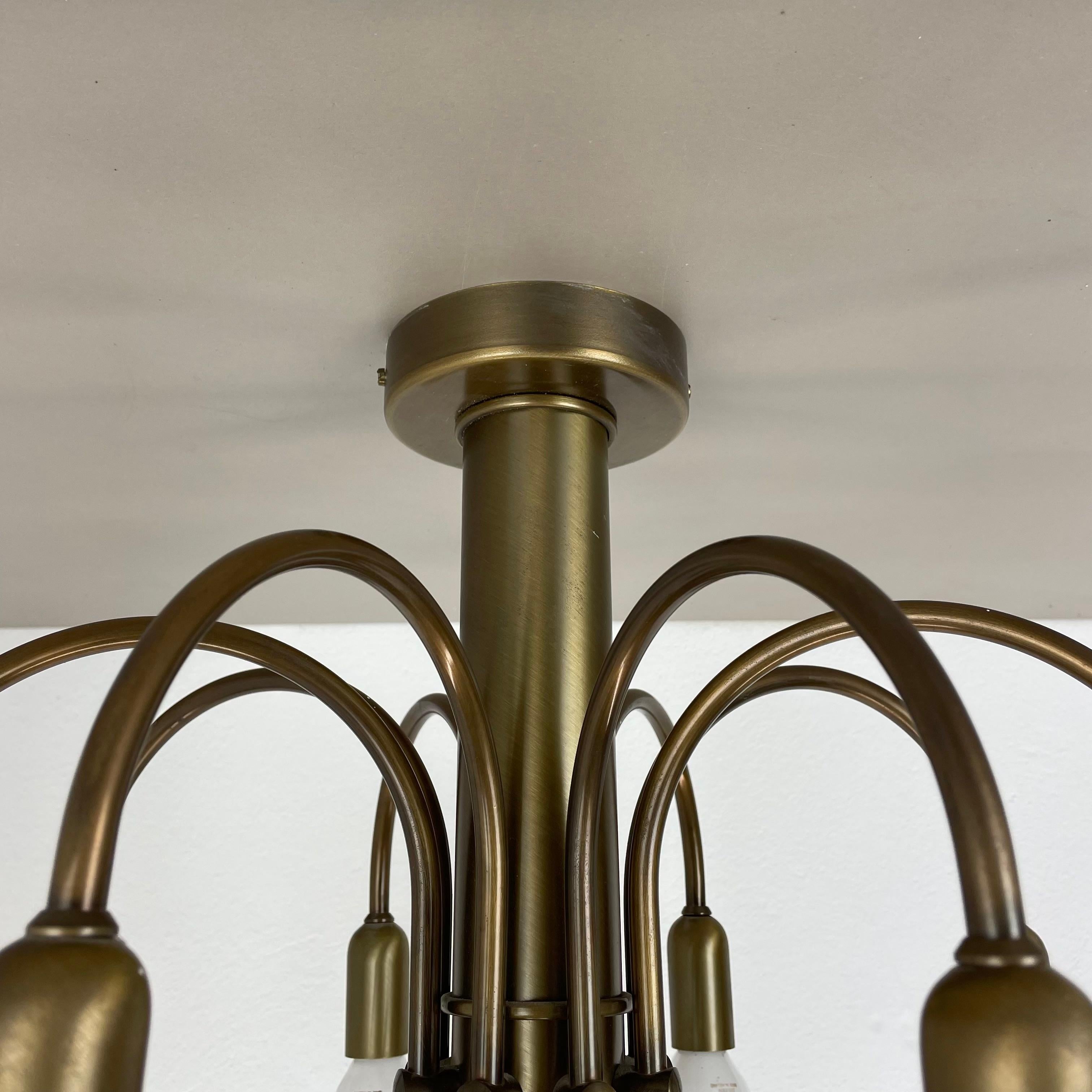 Metal large 12-armed solid Brass ceiling light Chandelier by WKR Lights, Germany 1970s For Sale