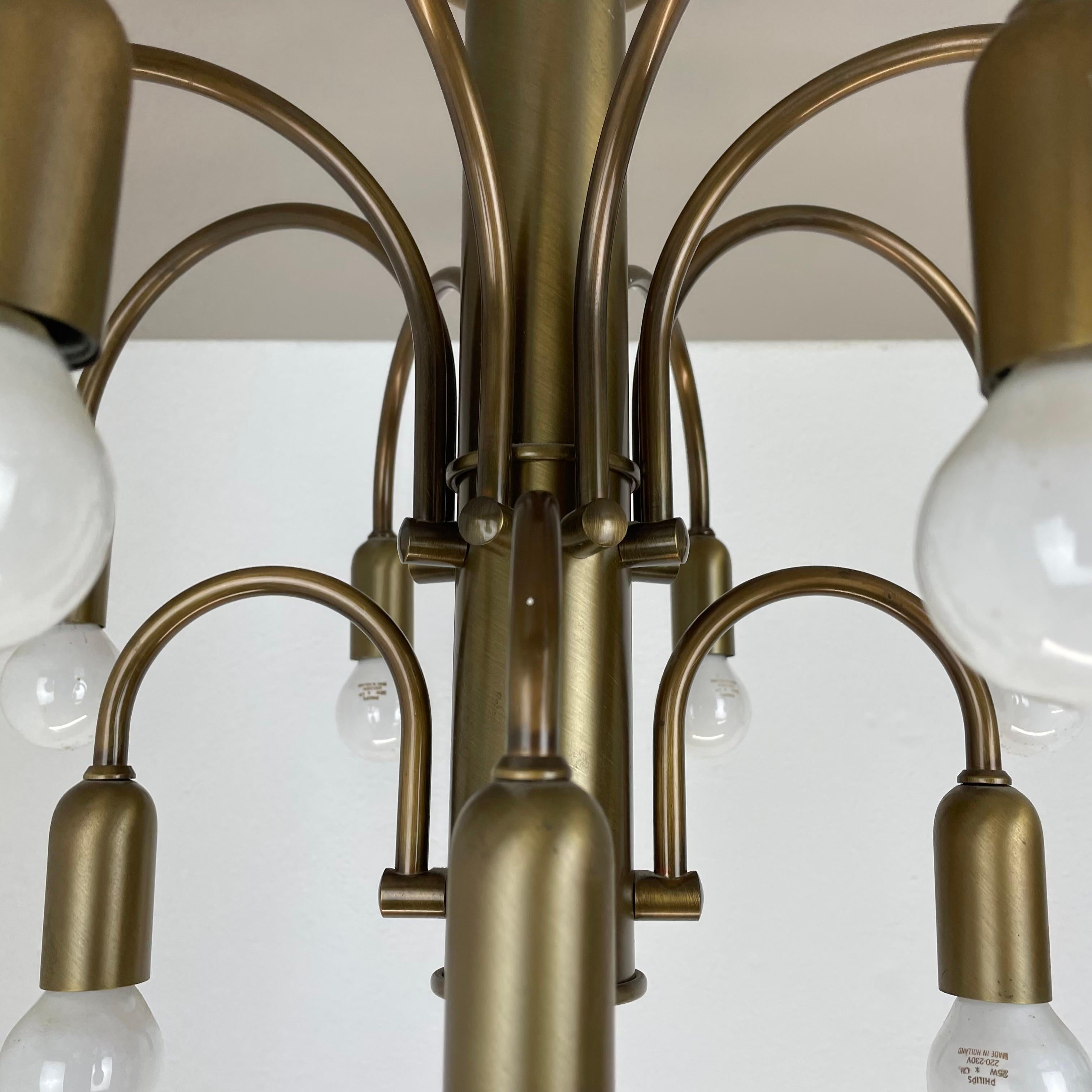 large 12-armed solid Brass ceiling light Chandelier by WKR Lights, Germany 1970s For Sale 1