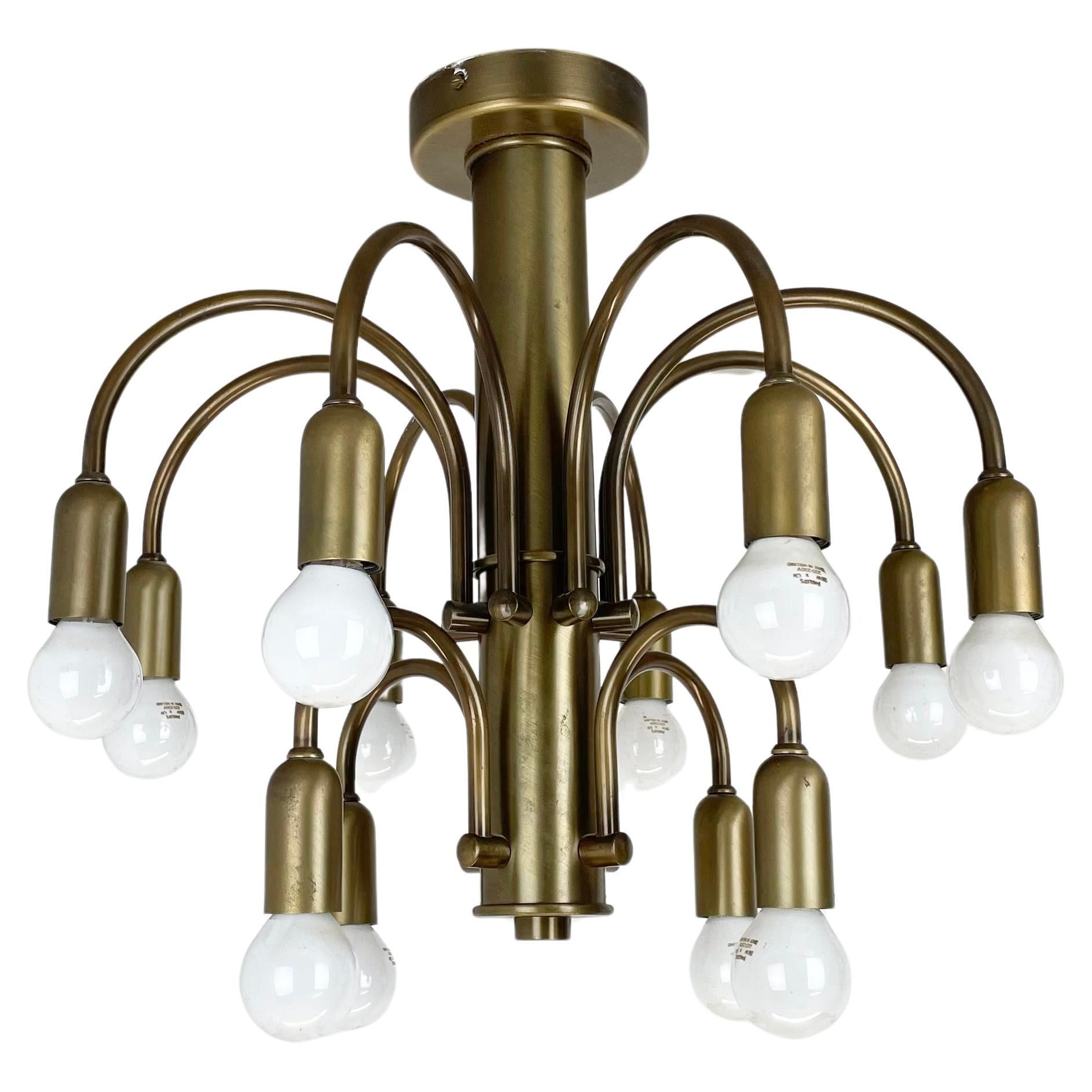large 12-armed solid Brass ceiling light Chandelier by WKR Lights, Germany 1970s For Sale