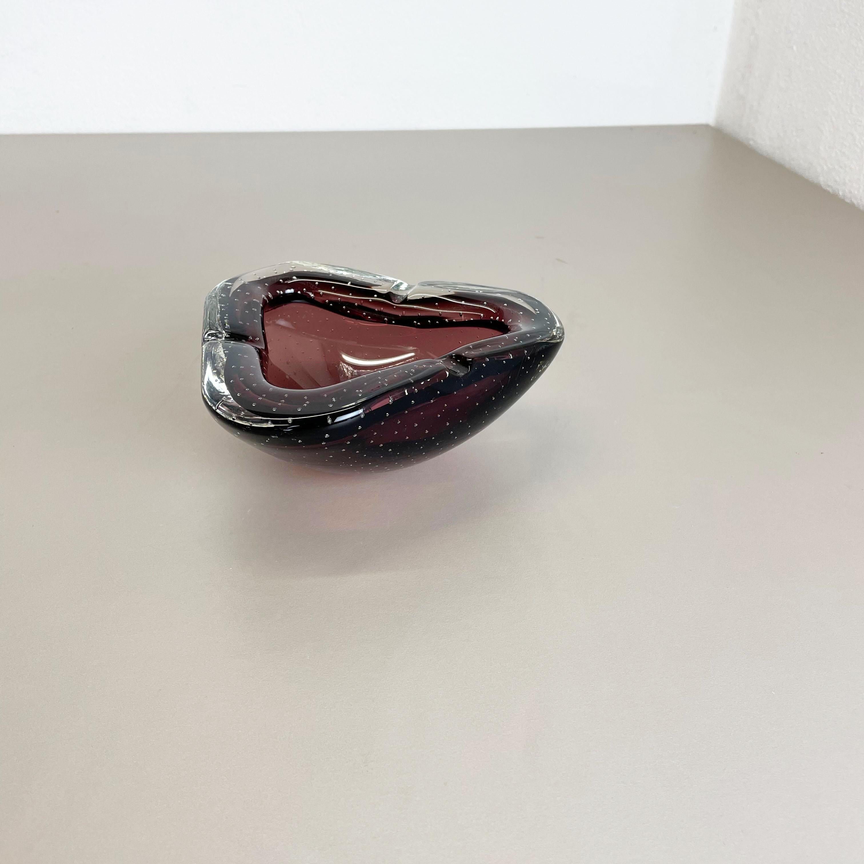 Article:

Murano glass bowl, ashtray element


Origin:

Murano, Italy


Decade:

1970s


This original glass shell bowl was produced in the 1970s in Murano, Italy. An elegant purple Murano glass element utilizing the bullicante