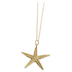 Dije Seastar de oro amarillo de 14 kt de Jennifer Liang