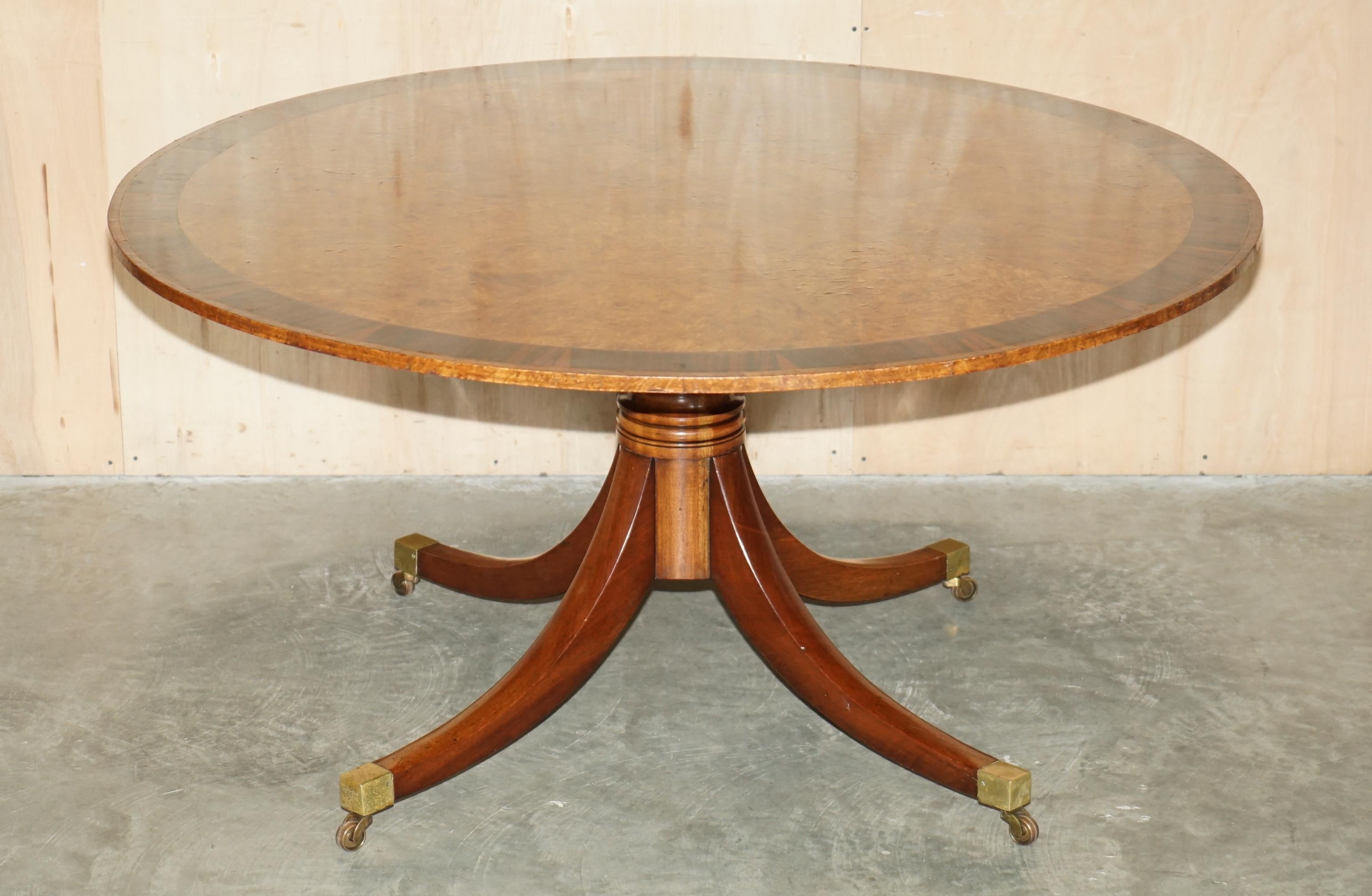 Royal House Antiques

Royal House Antiques is delighted to offer for sale this absolutely exquisite, Regency style, large round dining or huge centre table made with wonderful rich cuts of Burr Walnut bordered with Macassar Ebony 

Please note the