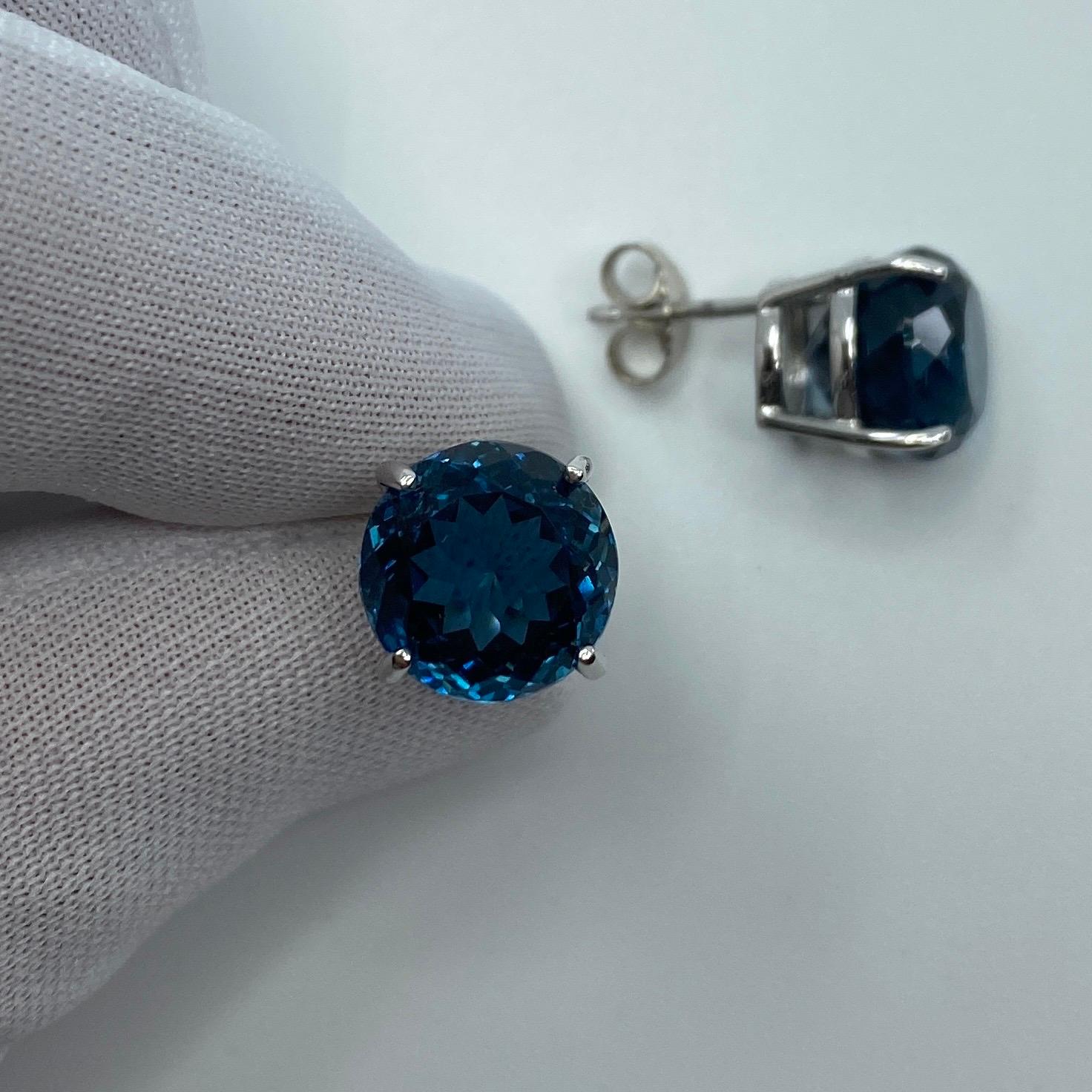 Large Natural London Blue Topaz Oval Cut Yellow Gold Earring Studs.

Beautiful 11mm matching pair of round cut topaz with vivid London blue colour, excellent clarity and an excellent round brilliant cut.
Very large 15.60 total carat weight.

Set in