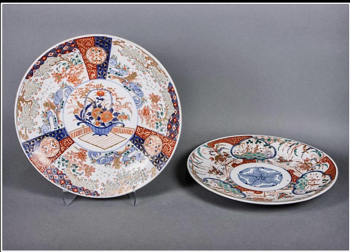 This a wonderfully large Imari Charger that dates to the late Meiji period. The charger features a central reserve of a traditional Japanese flower basket; the basket is surrounded by reserves of the 