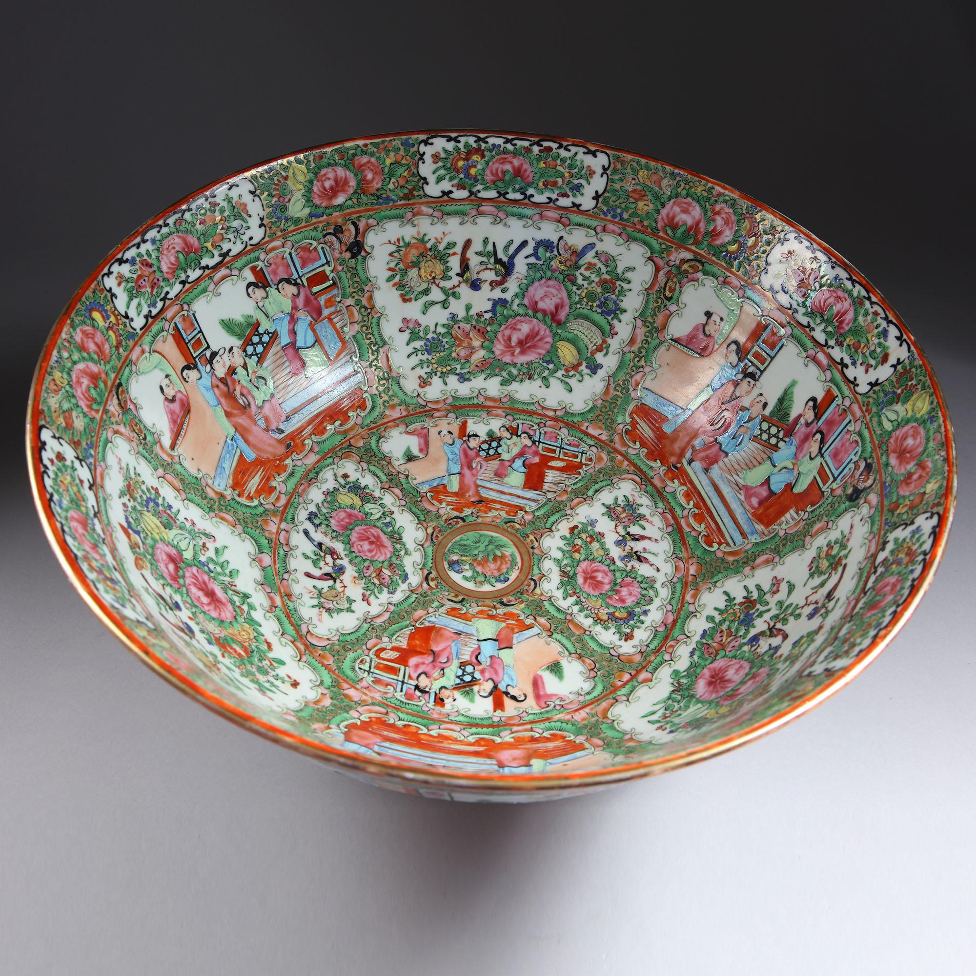 A large 16 inch canton 'Rose Medallion' porcelain punch bowl, the base unmarked.
Chinese Export, circa 1870

Measures: Diameter 40cm - 16 in
Height 15.5cm - 6in.