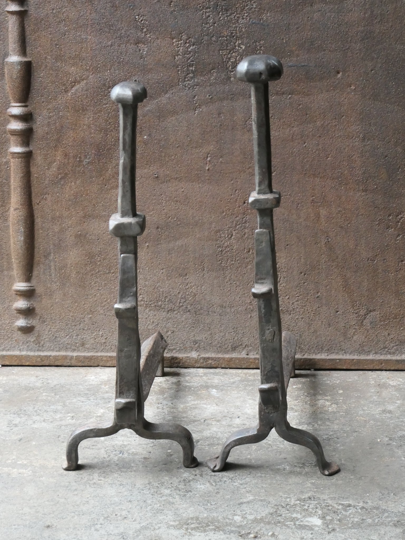 Beautiful 17th - 18th century French andirons - fire dogs made of wrought iron. These French andirons are called 'landiers' in France. This dates from the times the andirons were the main cooking equipment in the house. They had spit hooks to grill