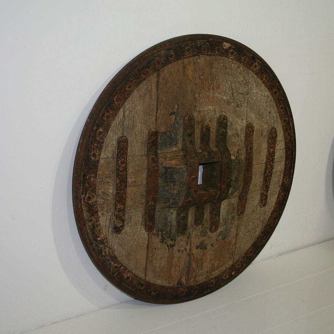 Beautiful and very rare Primitive chariot wheel. Great weathered look,
Spain, circa 1600-1750. Weathered, small losses.