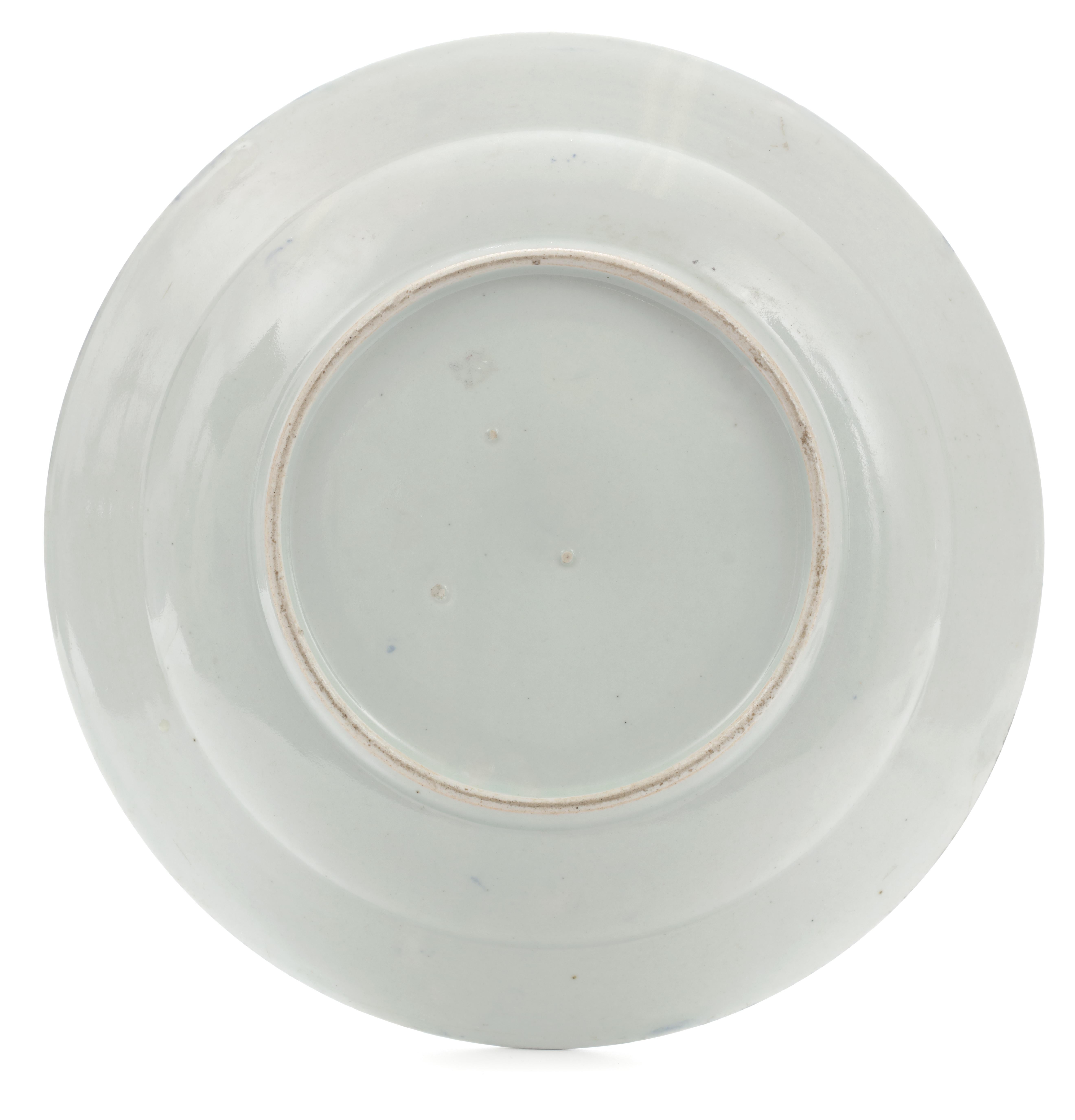 A Japanese Arita blue and white porcelain VOC dish.

Arita, late 17th century

Measure: Diameter 32.1 cm

These dishes, ordered by the VOC during the second half of the 17th century, were copied after the popular Chinese Wanli ‘Kraak’