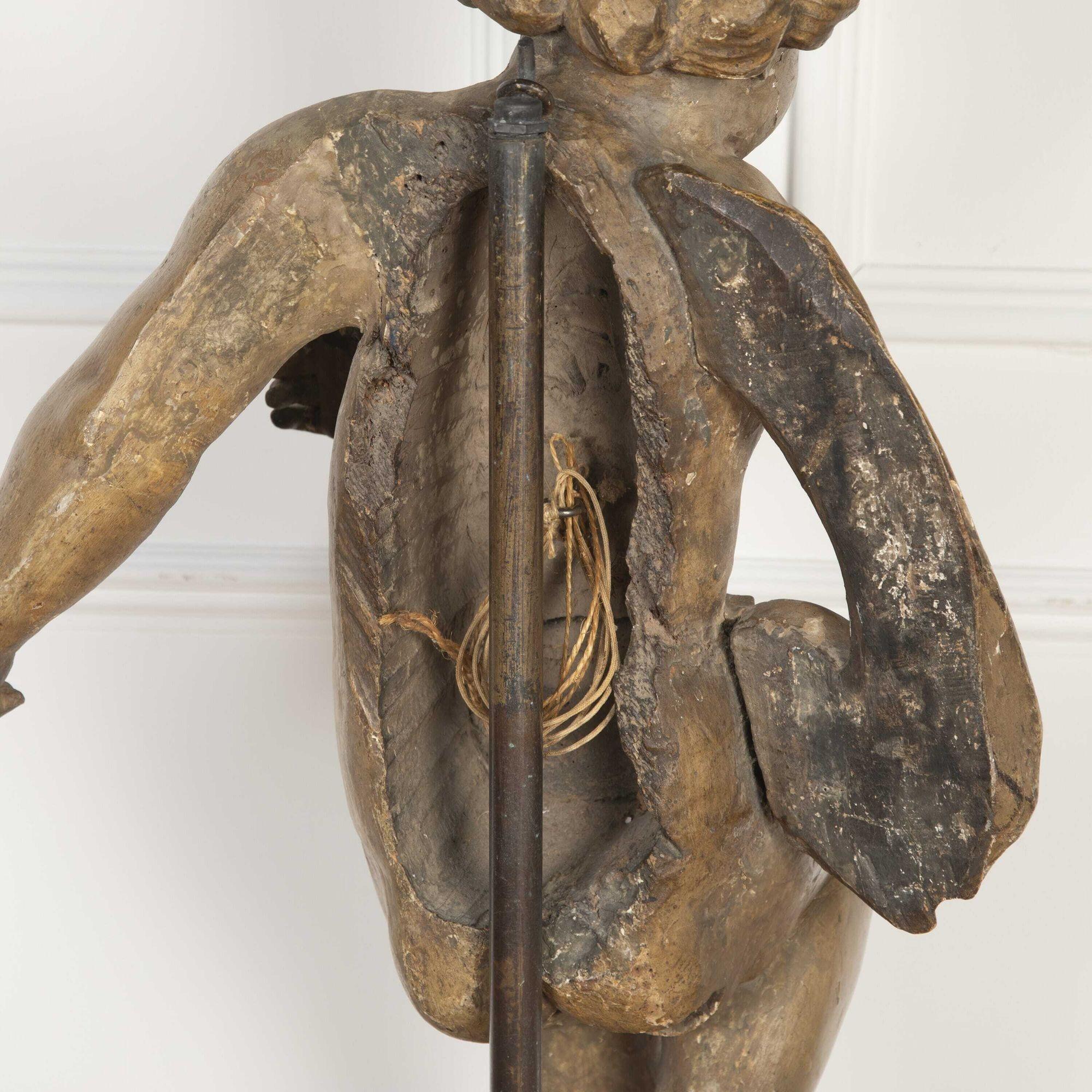 Large 17th century Italian cherub.
Dating from the 17th century and of Italian origin, this impressive large cherub is in carved wood with original paint and mounted on a later stand.
The size of the stand is 135 cm.