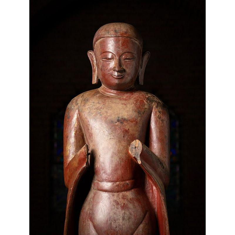 Material: wood
Measures: 187 cm high 
39,5 cm wide and 34,5 cm deep
With traces of 24 krt. gilding
Ava style
Namaskara mudra
Originating from Burma
17th century.

