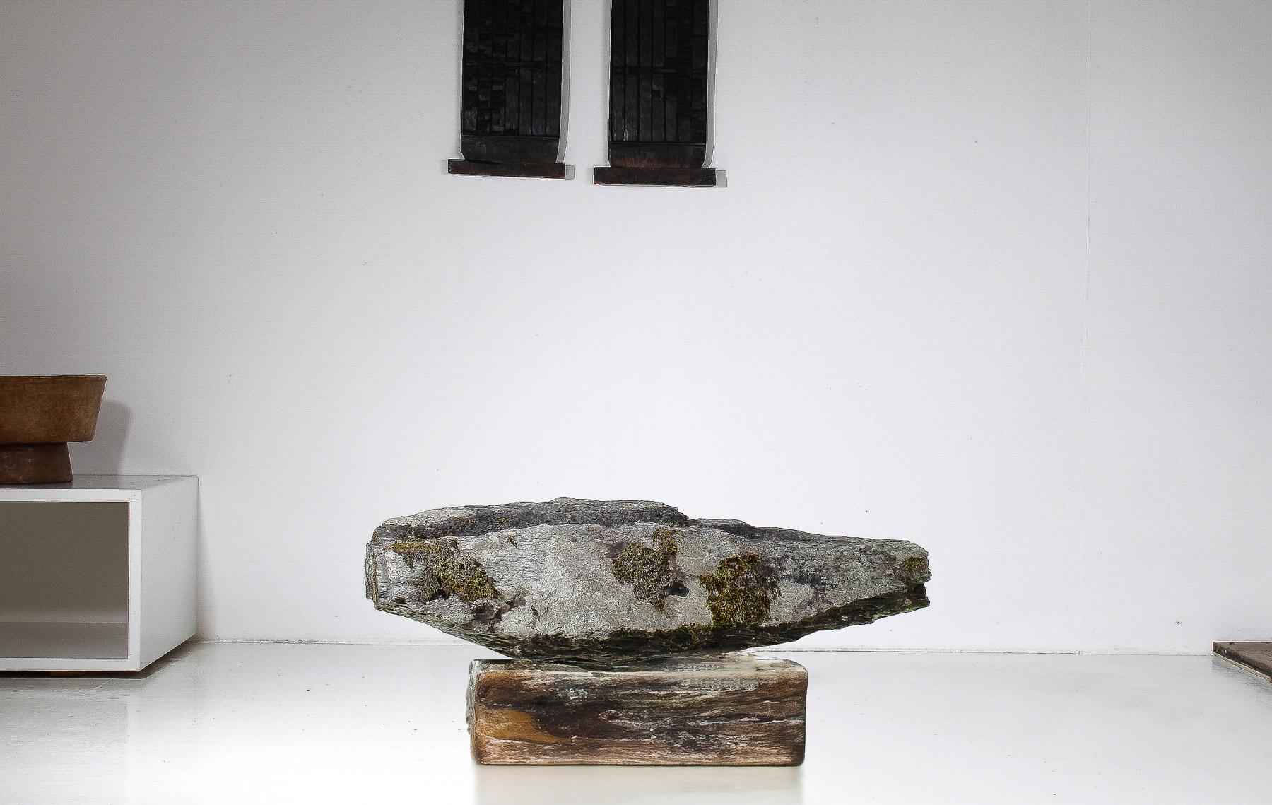 This reclaimed 17th-century sedimentary stone trough from Egryn Hall in Gwynedd, Wales, is a remarkable artefact steeped in history. Crafted from local sedimentary stone, its rugged texture and earthy tones reflect the natural materials of its time.