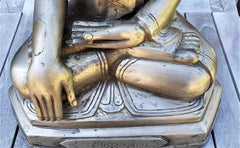 Large 18/19thC  Burmese bronze Buddha with inscription on the front of the base.