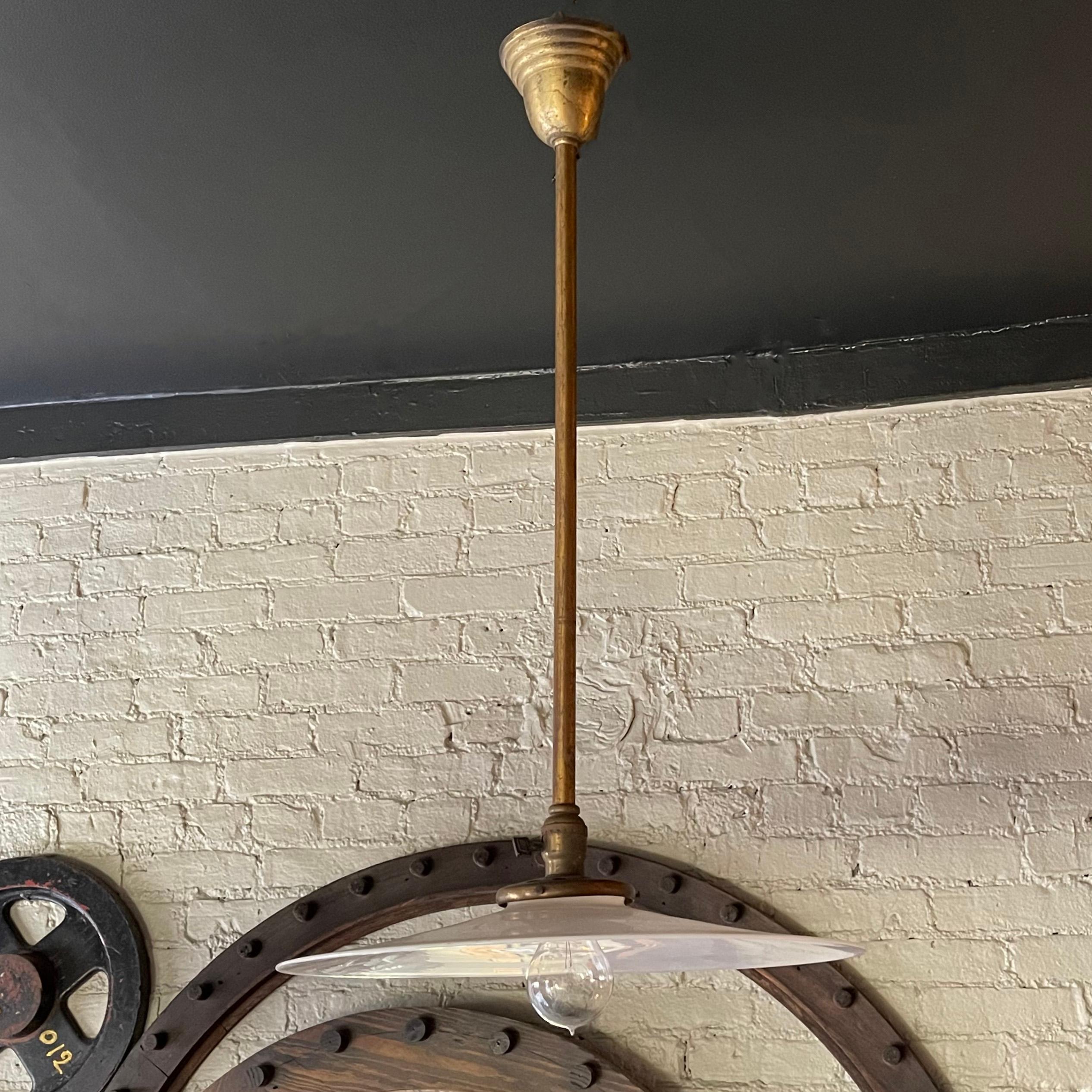Large Industrial Milk Glass Disc Pendant Light In Good Condition For Sale In Brooklyn, NY