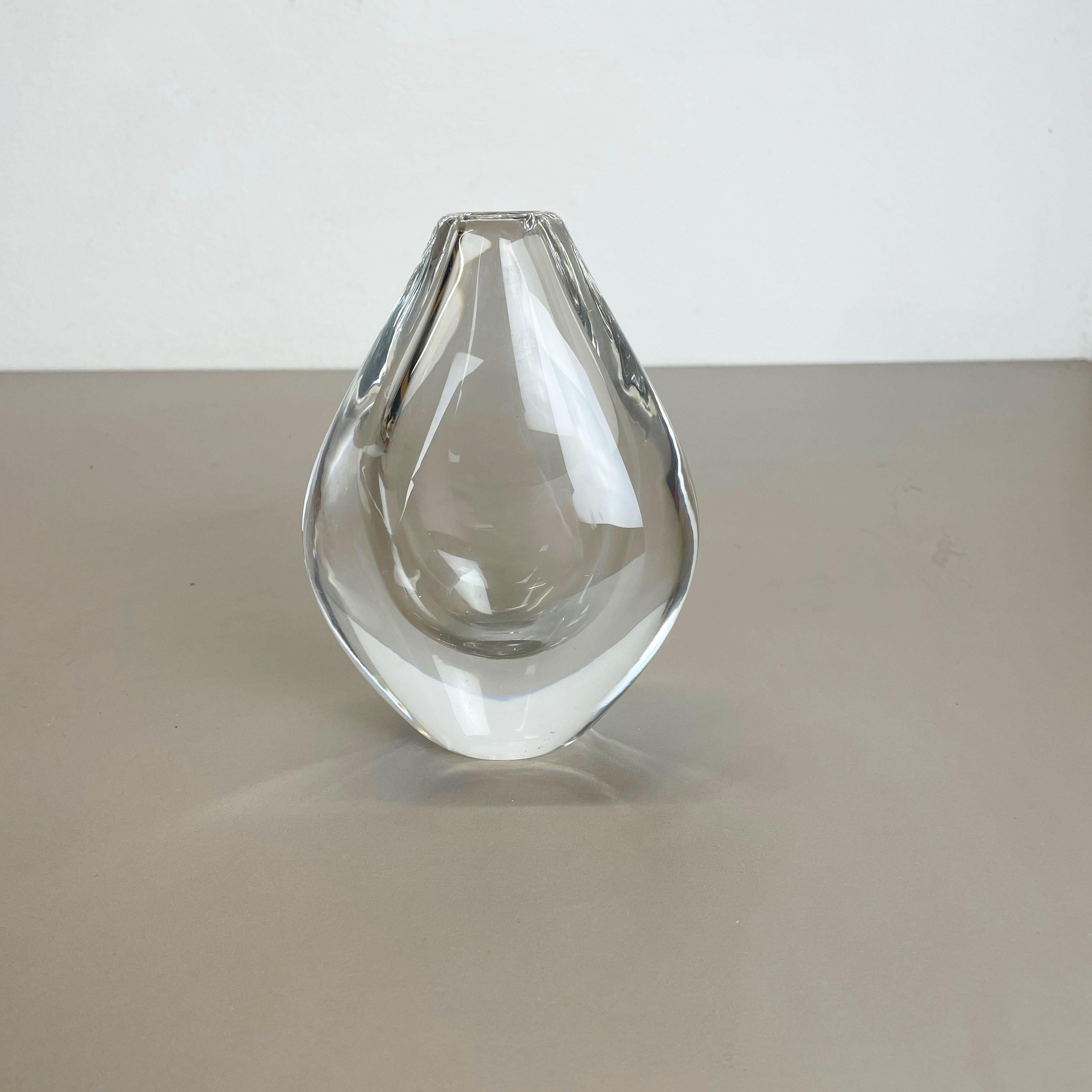 Article:

glass vase


Design:

Sven Palmqvist


Producer:

 Orrefors, Sweden 1970s

Age:

1970s


Description:

Wonderful heavy glass element designed by Sven Palmqvist and produced by Orrefors in Sweden in the 1970s. the