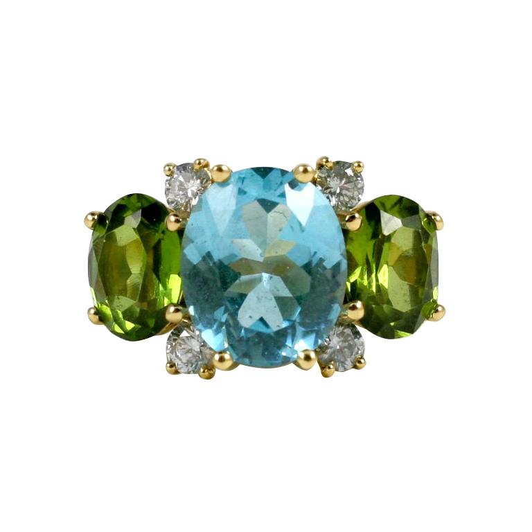 Großer Tropfenring aus 18kt Gelbgold mit blauem Topas und Peridot