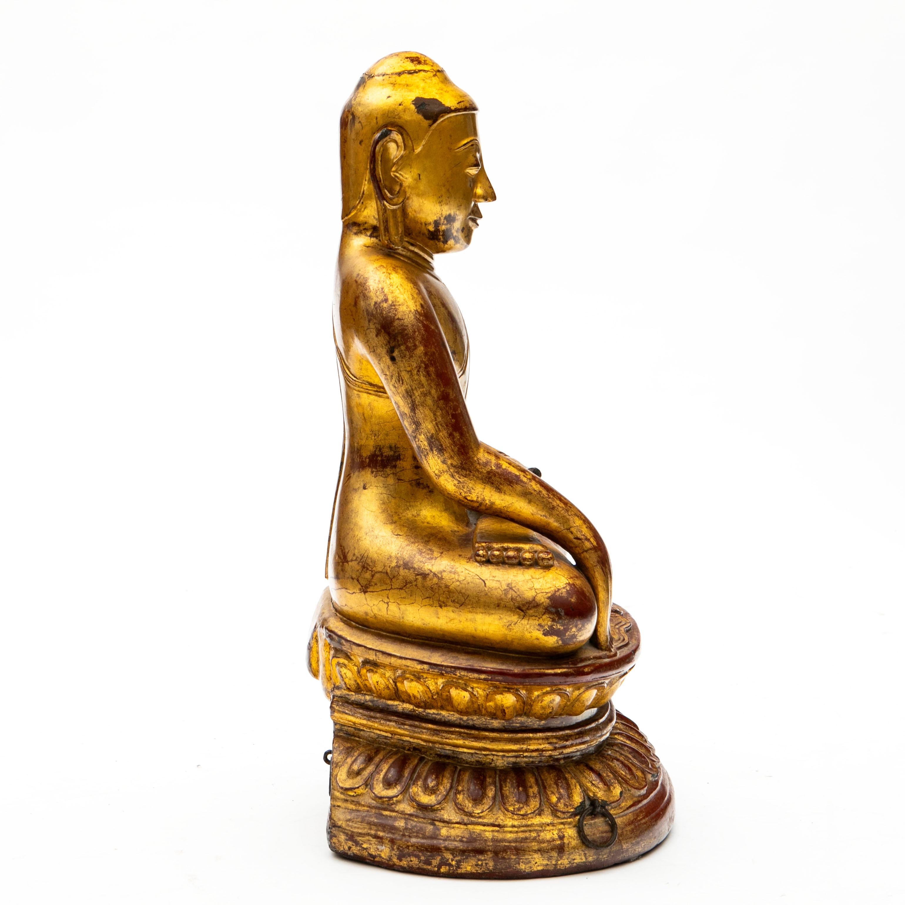 Large Antique Buddha (99 cm) from a Temple in Burma, crafted in hardwood, likely Burma teak.

Beautifully and intricately carved, the Buddha is depicted in Bhūmisparśa Mudrā, a classic hand gesture symbolizing Buddha’s triumph over Mara and the