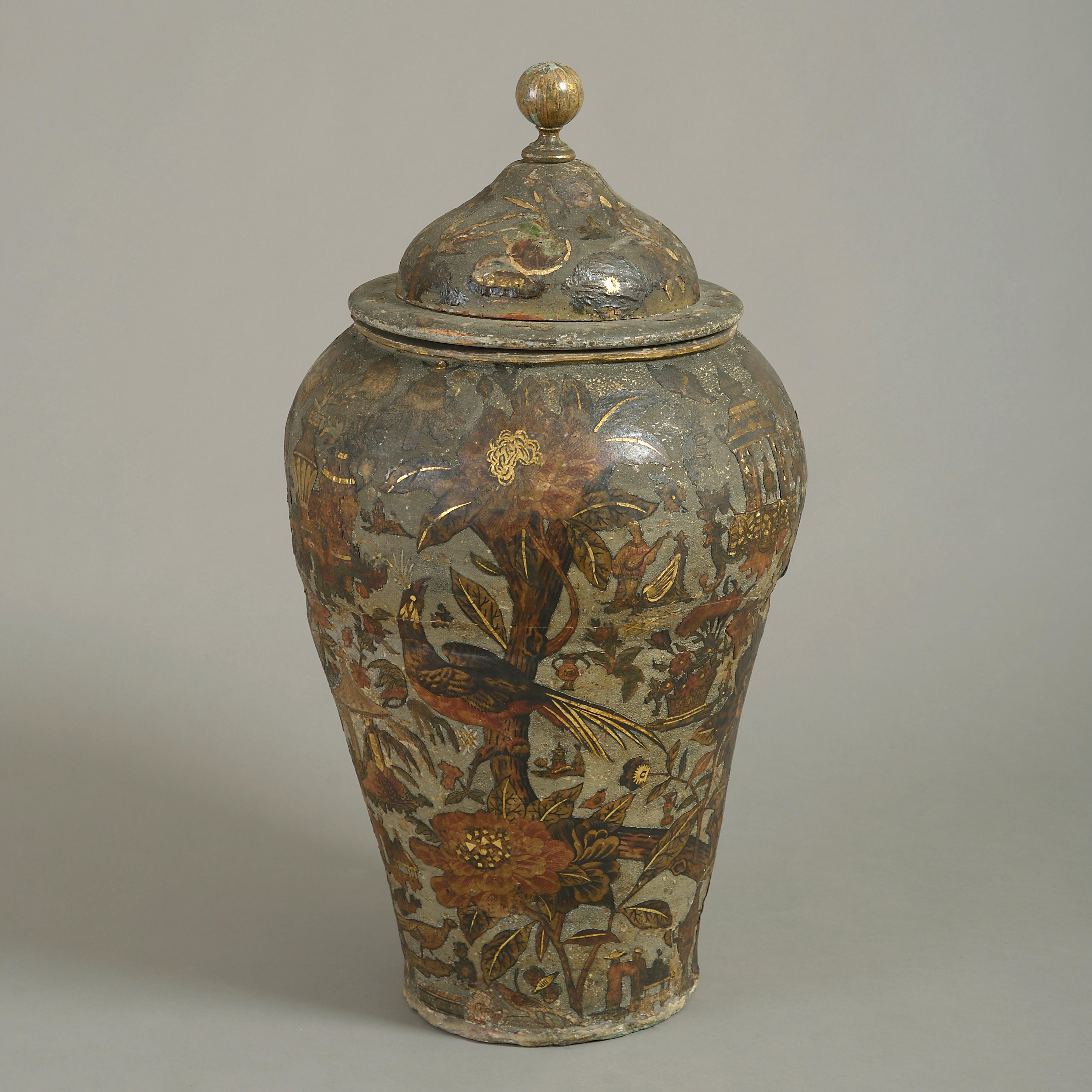 A rare ant tall 18th century arte povera vase, having a lid with finial knop, decorated throughout with applied polychrome flowers, foliage and chinoiserie upon a cold painted grey green ground.

Most probably piedmont.