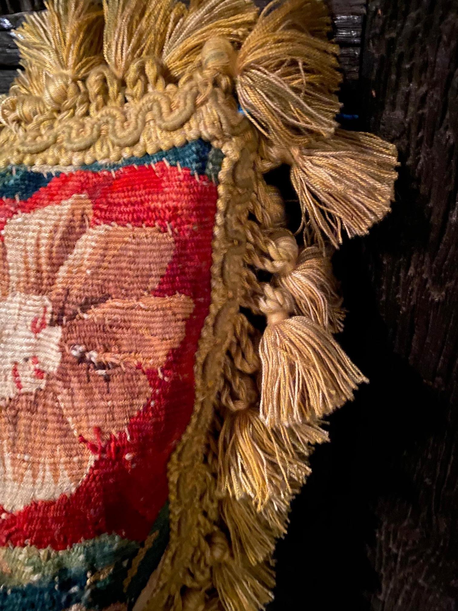 Impressive large, colorful early 18th century Aubusson tapestry cushion with gold tassel fringe.
Measures: 24