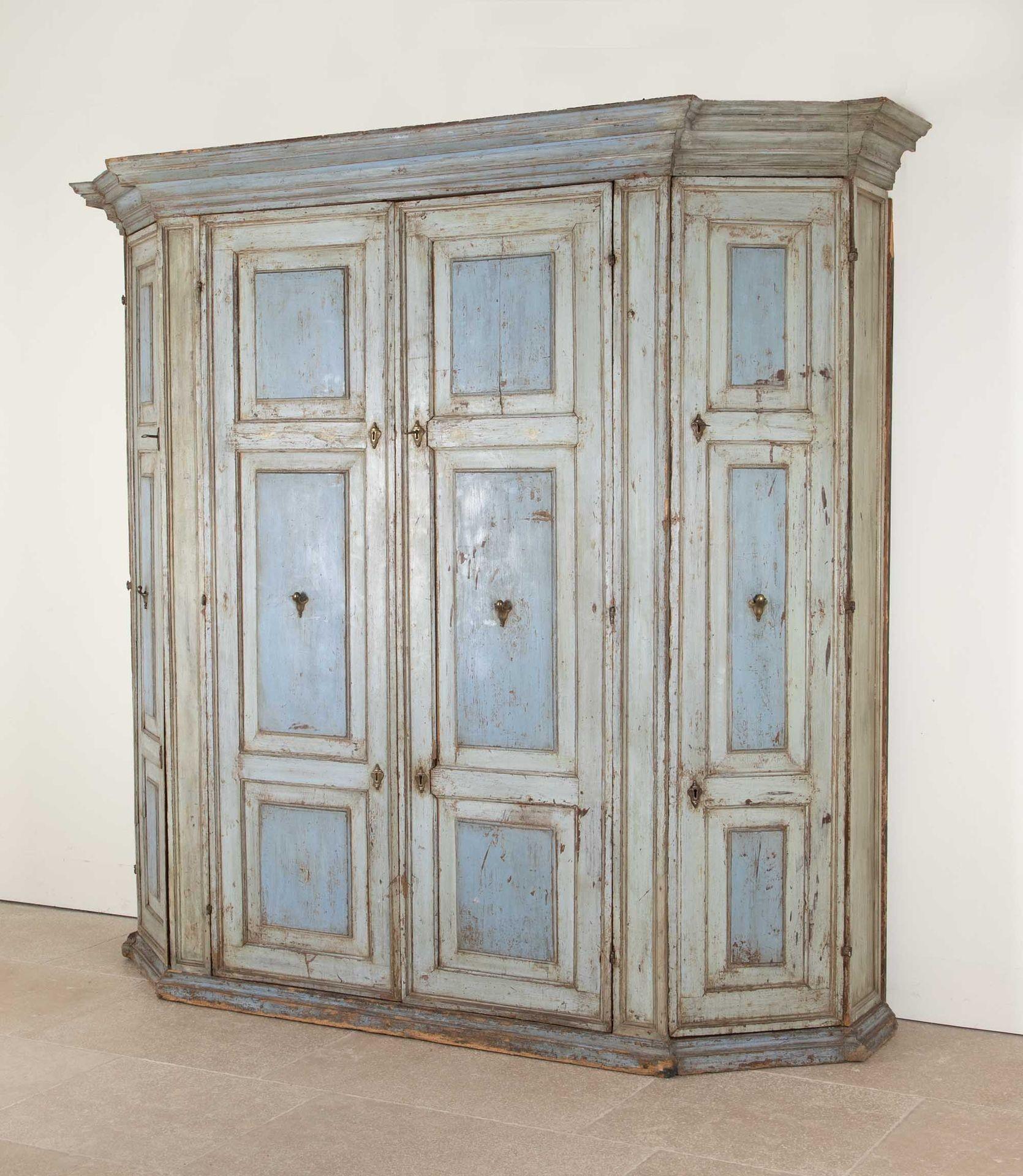 A beautiful and very large scale 18th Century blue painted Italian cupboard.