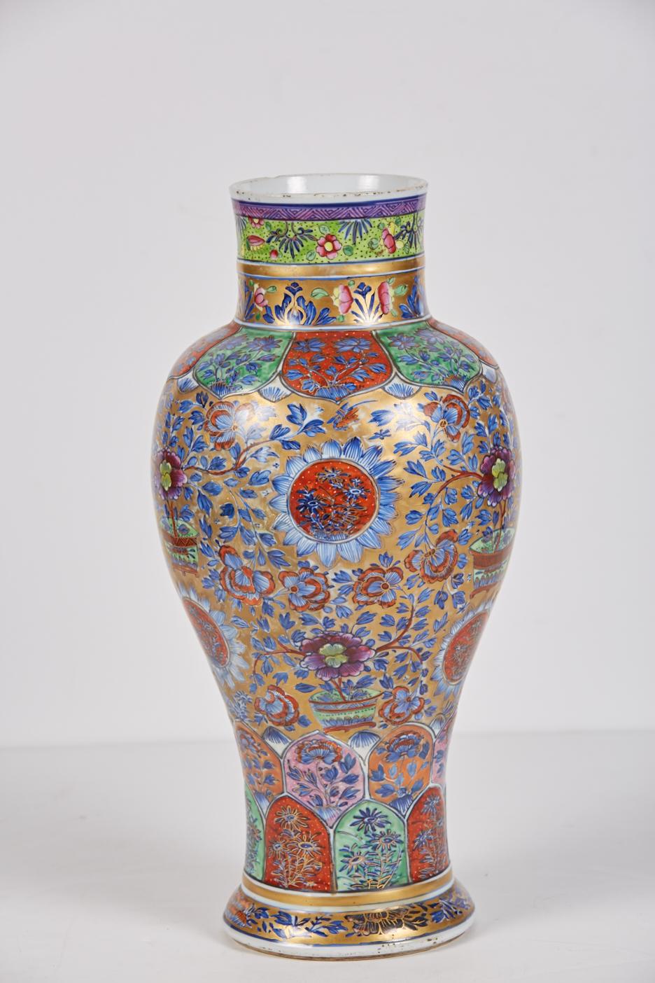 Very large polychrome clobbered 18th century Chinese export porcelain vase decorated in England in the 19th century. The base has a double circle in under glaze blue with an unidentifiable center mark (perhaps sacred fungus), again in under glaze