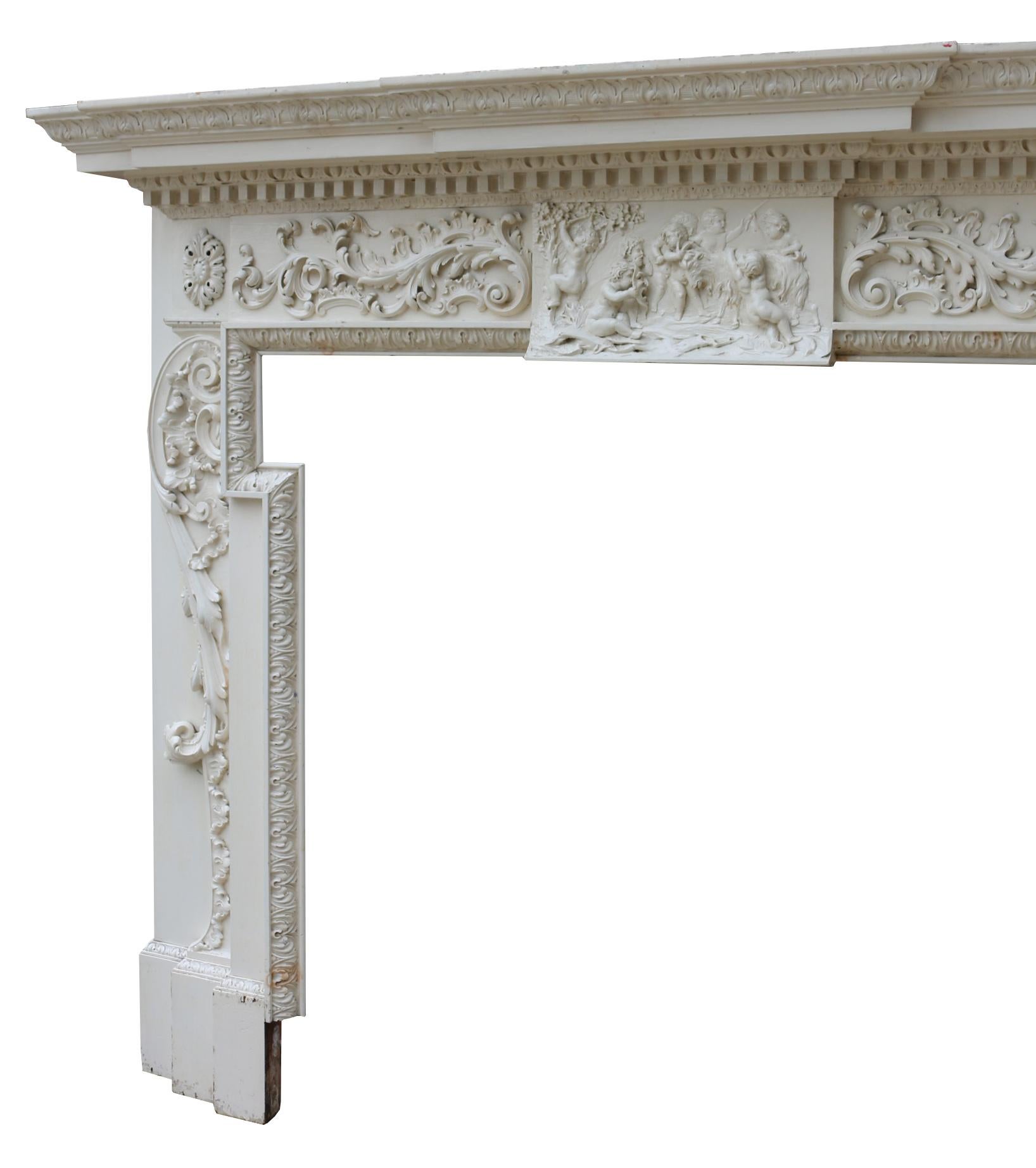 A richly decorated 18th century fire surround, originally from Hambledon House, North Yorkshire.

We believe the carving to be 18th century, with the structure altered and added to around 1900.

Opening height 129 cm

Opening width 139